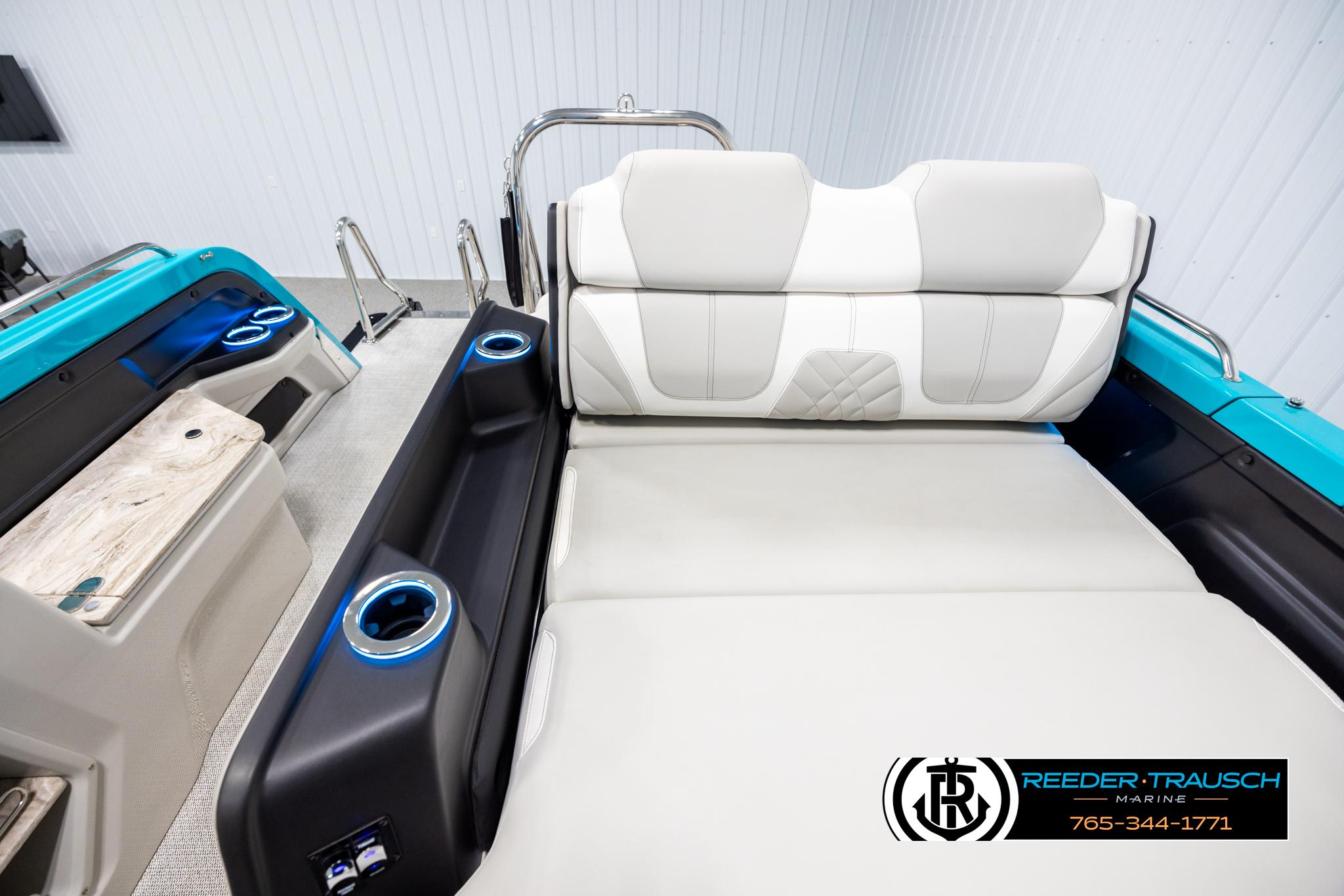 2025 Avalon 2585 Excal VRBW boat interior with luxurious seating and cup holders.