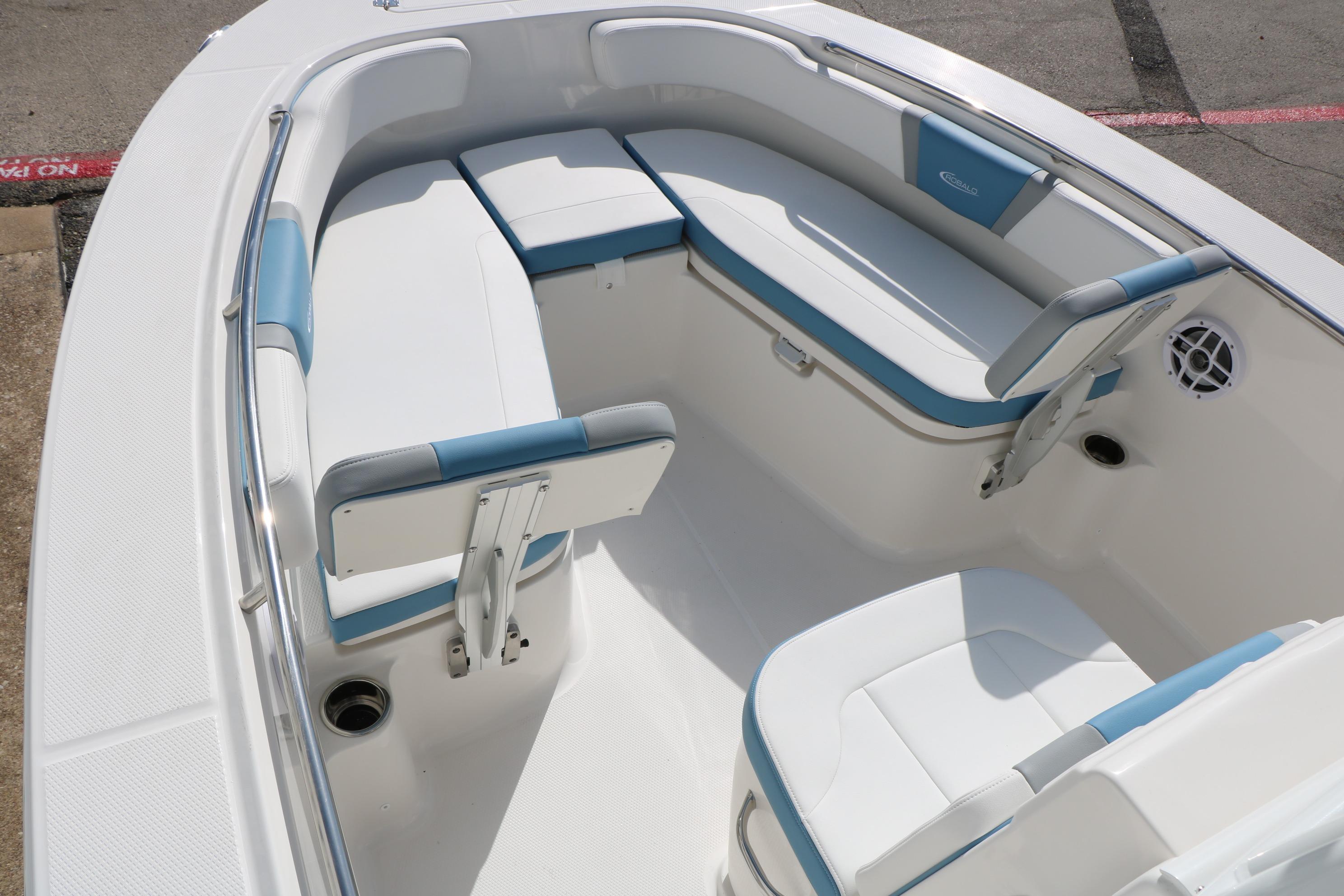2026 Robalo R200 Center Console boat interior with white and blue seating.