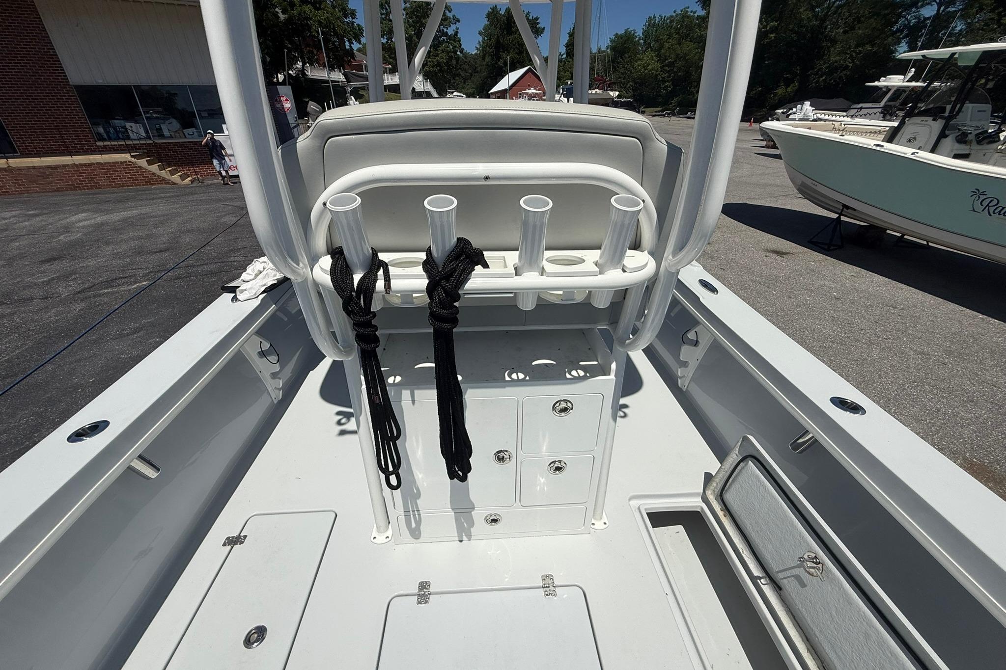 2024 Pair Customs 24 Center Console MV boat interior with rod holders and storage compartments.