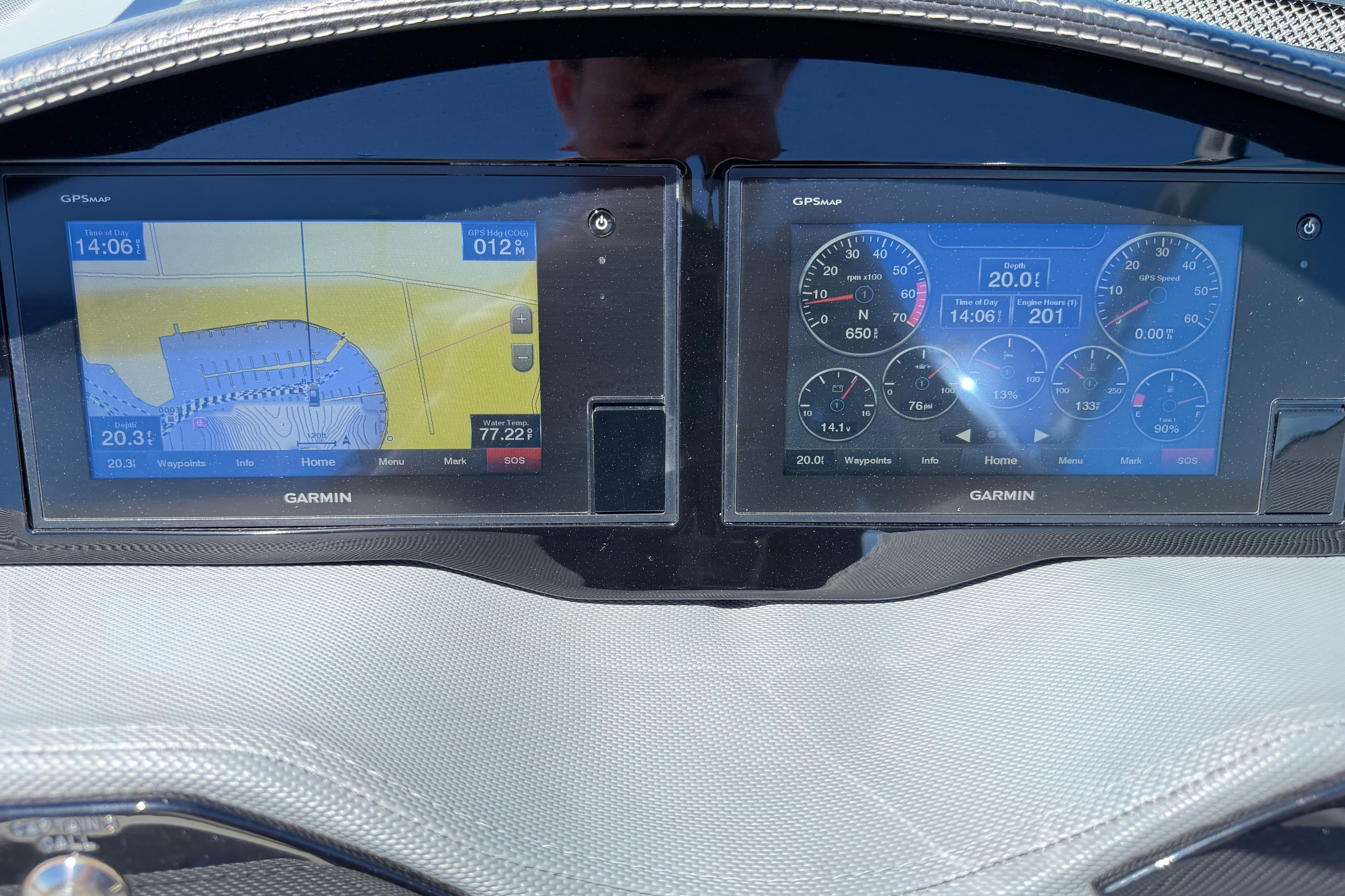 Dashboard of a 2020 Cobalt R3 boat with Garmin GPS displays.