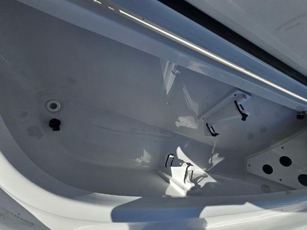 2026 Sea Hunt BX 22 BR boat storage compartment, featuring a sleek, white interior design.