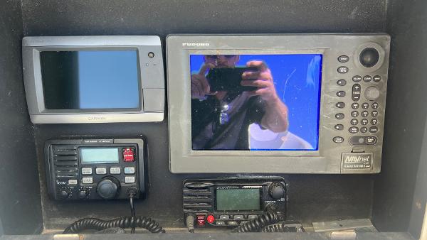 2005 Contender 36 Open boat dashboard with navigation and communication equipment.