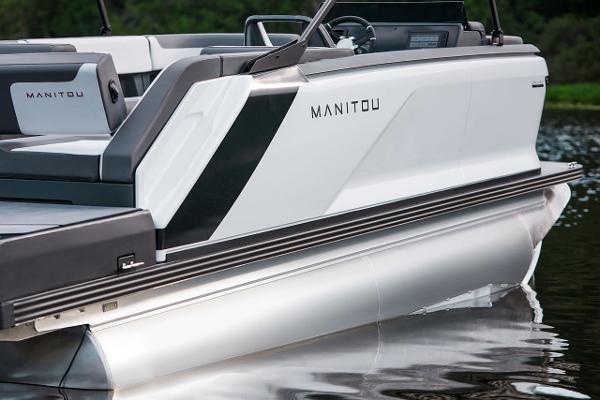 Manufacturer Provided Image: 2025 Manitou Cruise boat on calm water.