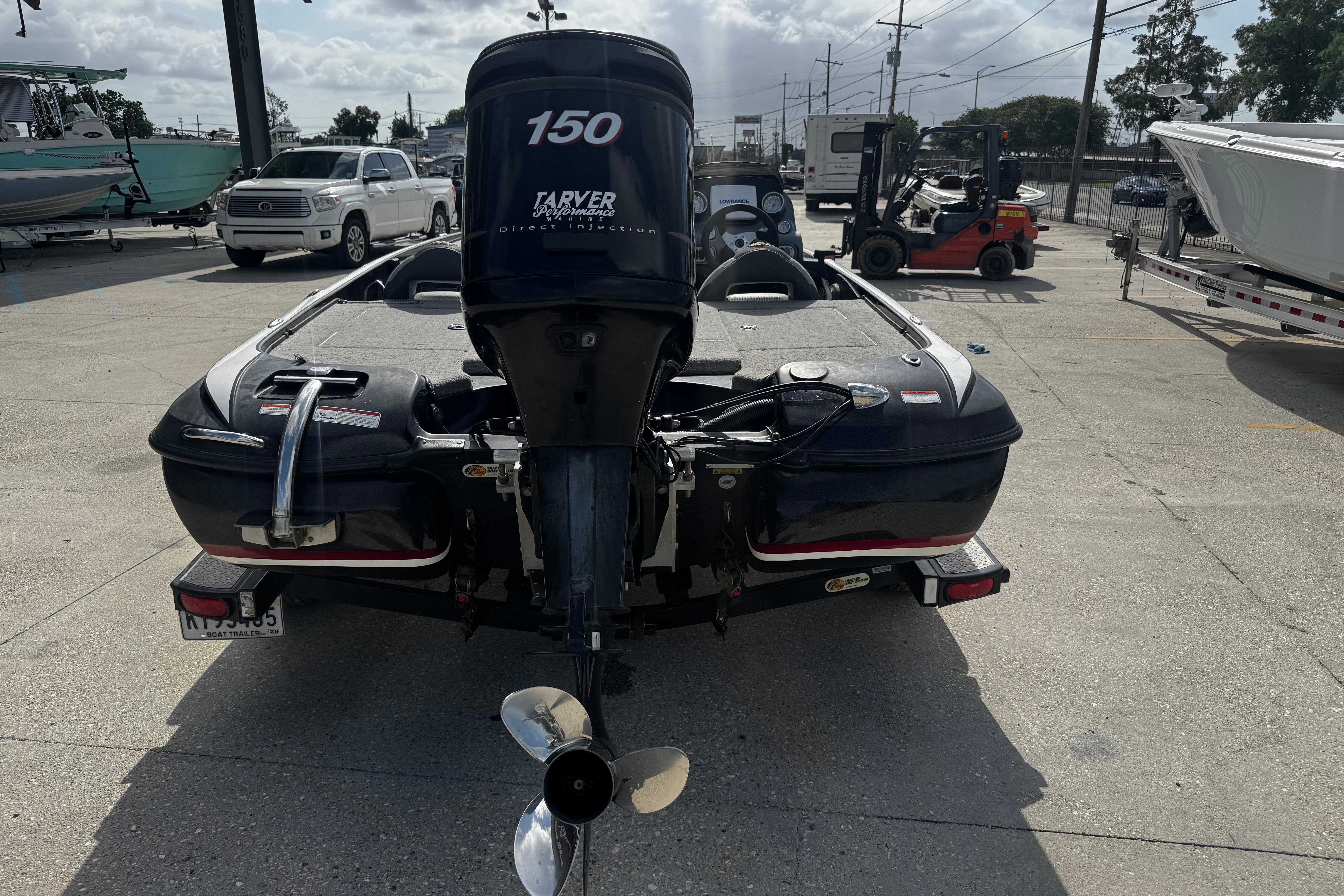 Rear view of a 2012 Nitro Z-7 boat with a 150 horsepower engine.