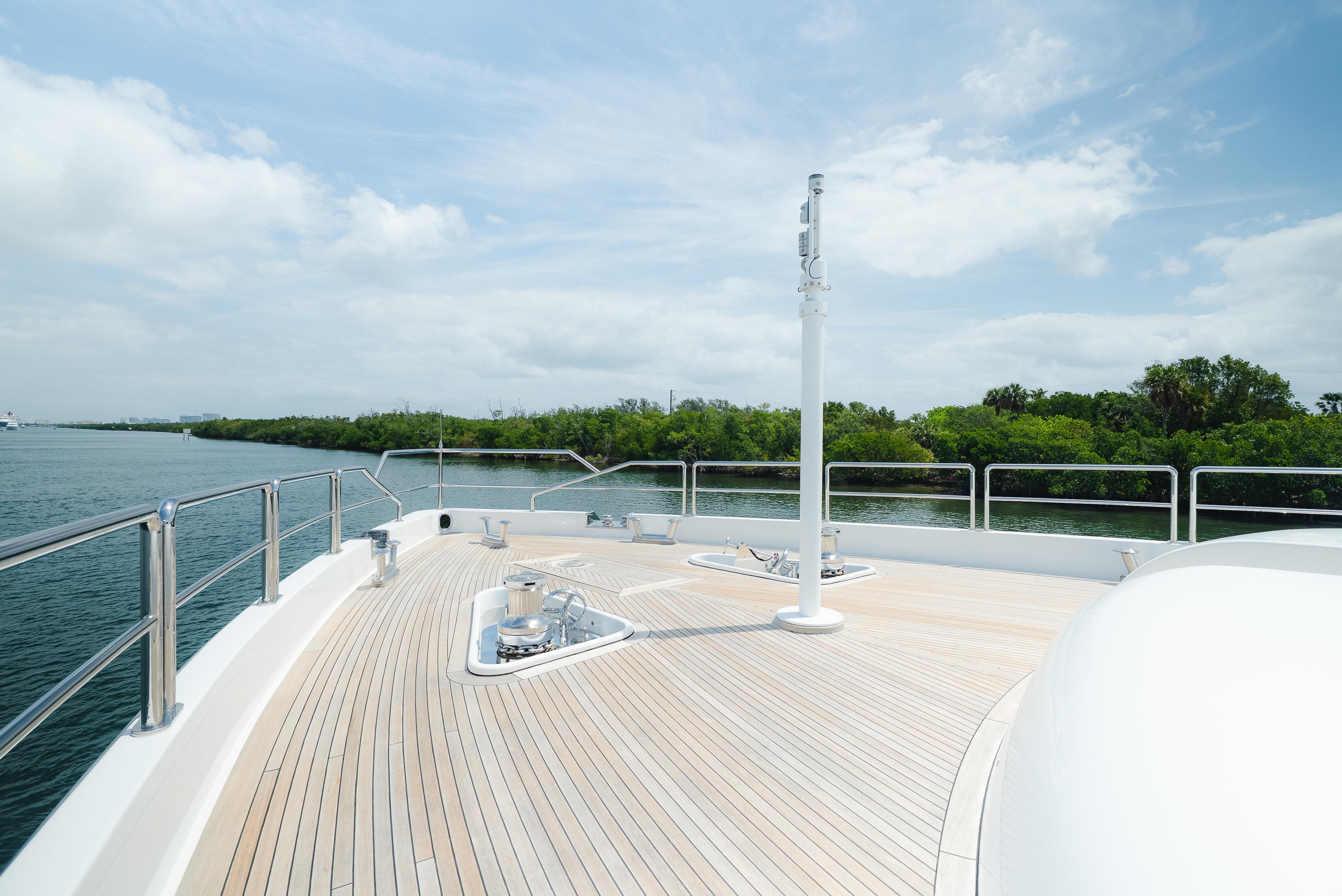 Deck of 2010 Arno Leopard 46 yacht with scenic water and greenery.