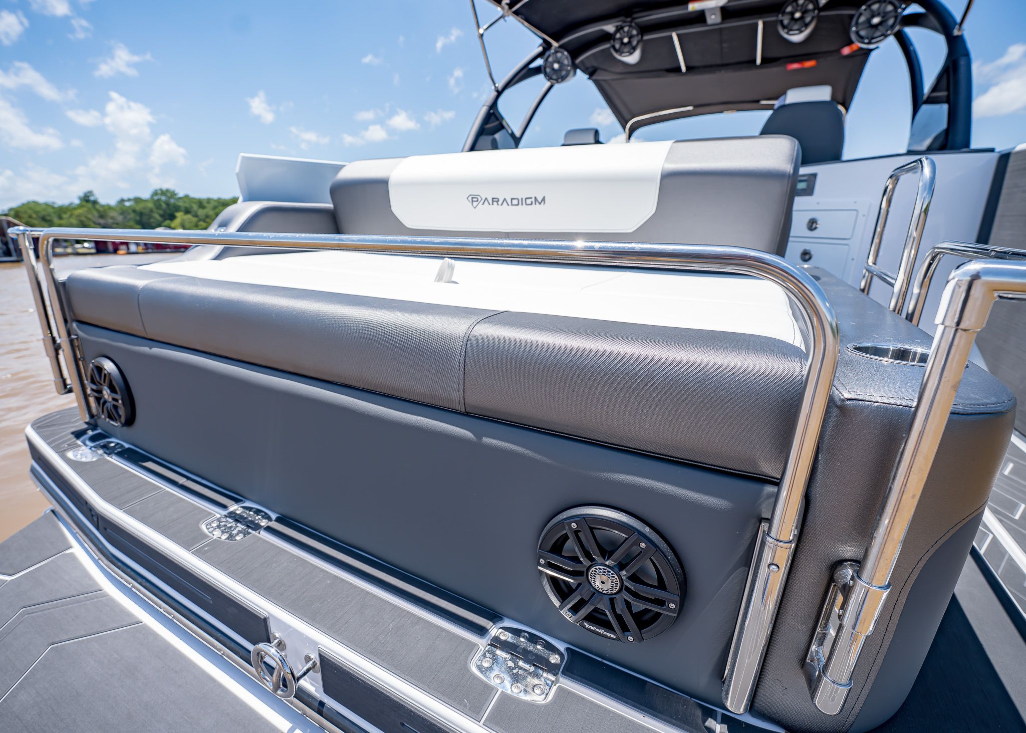 2025 Paradigm 266 SL SURF boat with luxurious seating area.