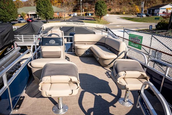 2025 Sun Tracker Bass Buggy 16 DLX pontoon boat with spacious seating and modern design.