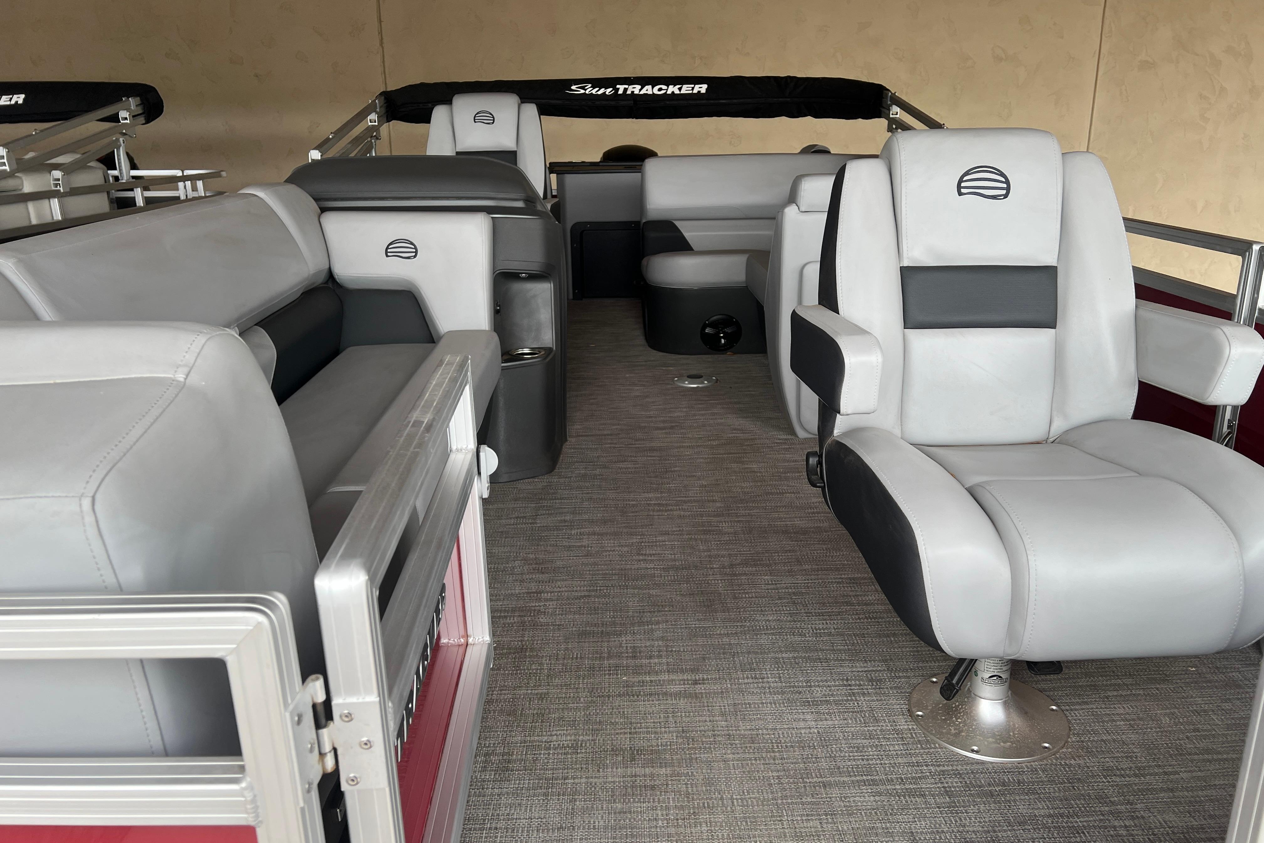 2026 Sun Tracker SportFish 20 DLX interior with plush seating and modern design.