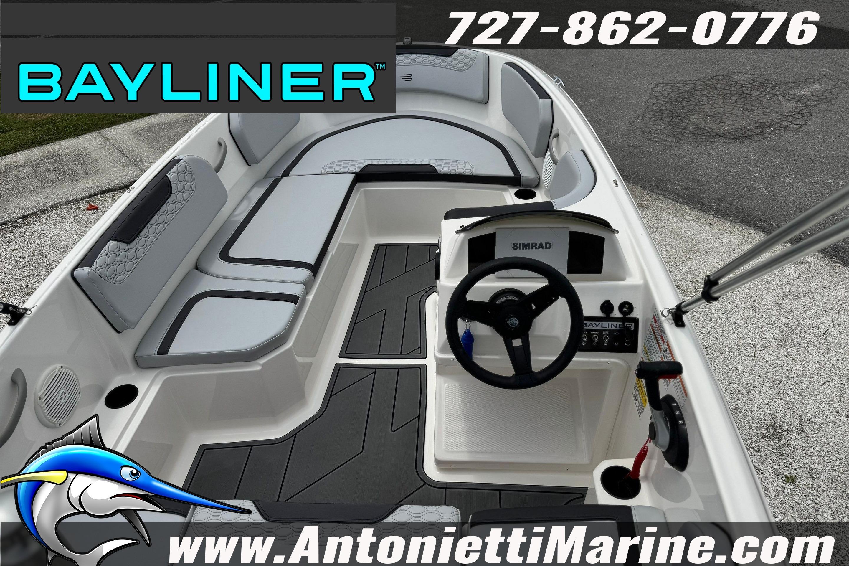 2024 Bayliner Element M15 boat interior with steering console and seating, displayed by Antonietti Marine.