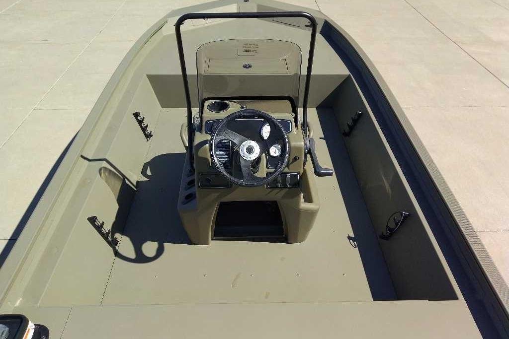 2026 Tracker Grizzly 1860 CC boat interior with steering console and spacious layout.