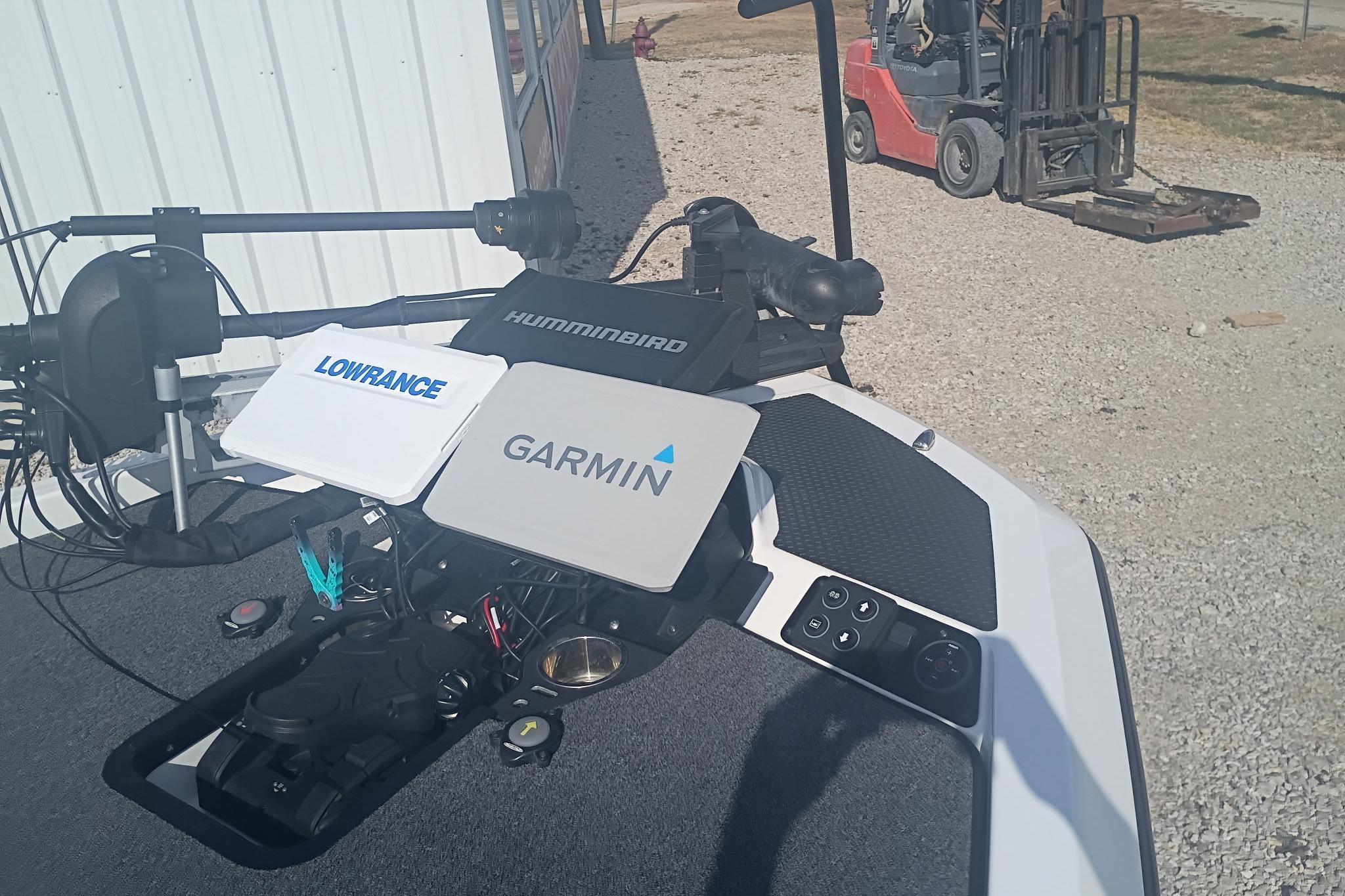 2024 iKon LX21 boat with Garmin, Lowrance, and Humminbird navigation systems on deck.