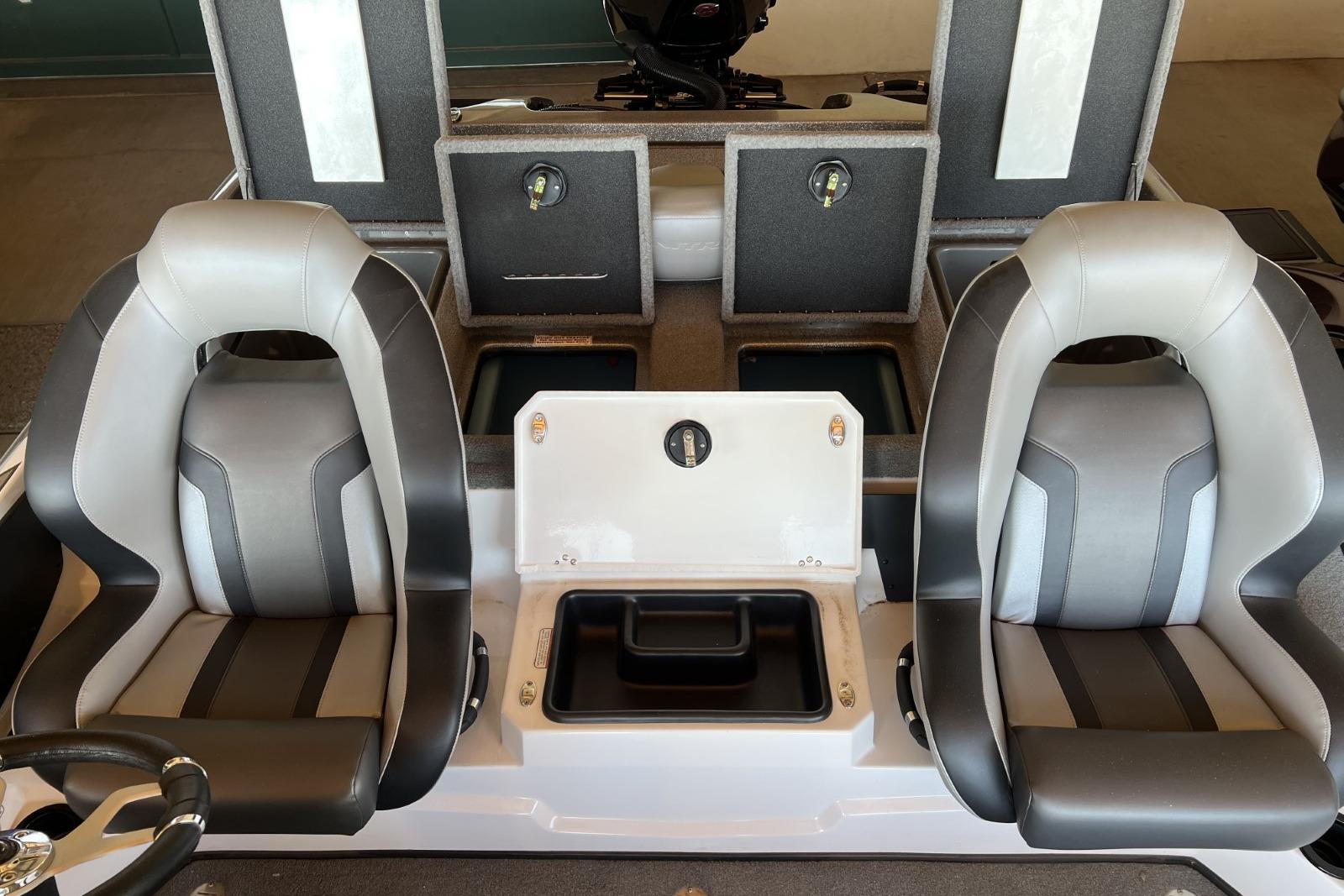 2025 Nitro Z19 boat interior with dual seats and storage compartments.