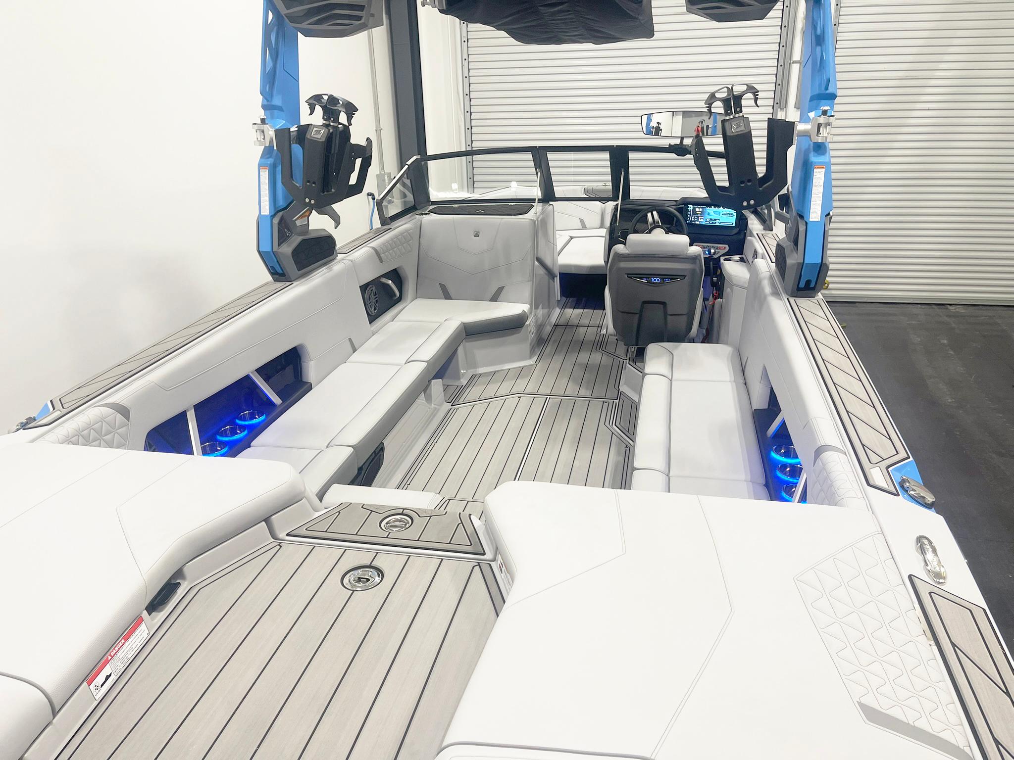 2025 Nautique Super Air Nautique GS24 interior with sleek seating and modern dashboard.