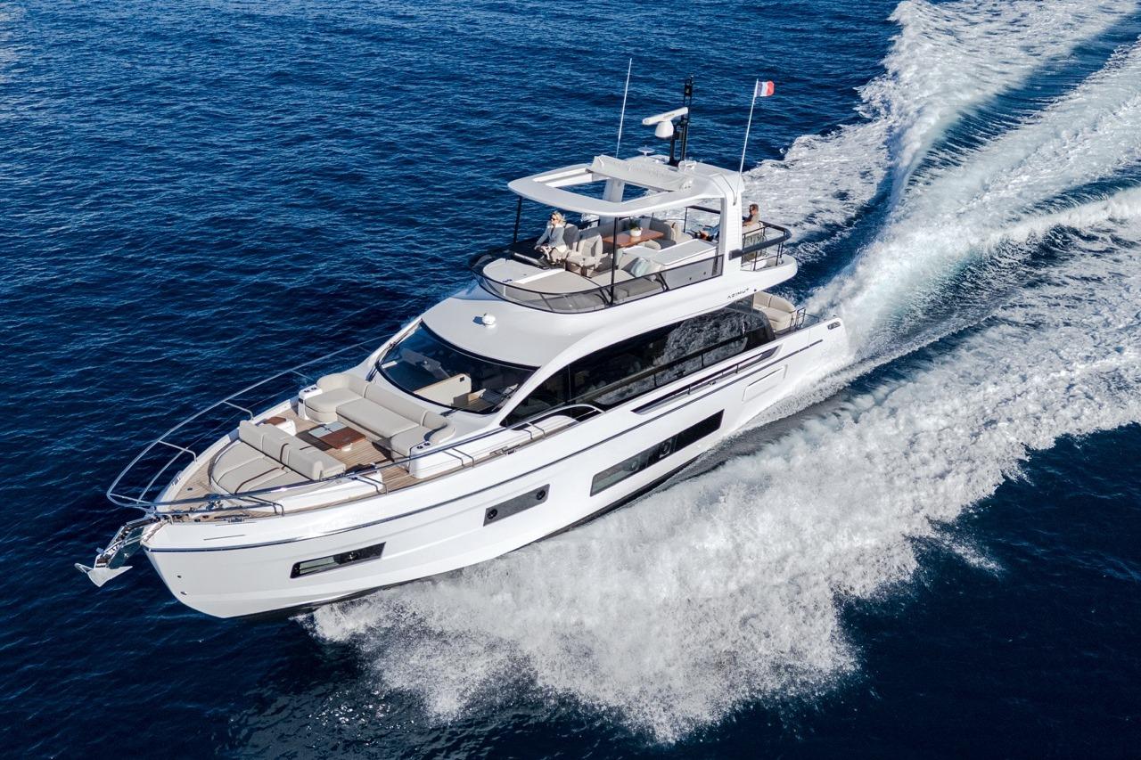 2025 Azimut Fly 62 yacht cruising on open blue sea.