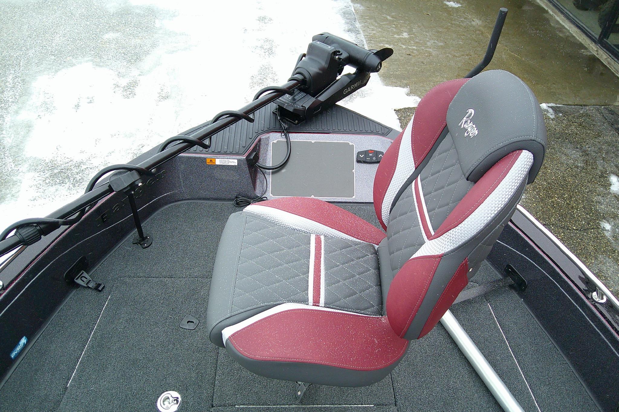 2026 Ranger 620xFS Pro boat seat with red and gray upholstery, featuring a Garmin device.