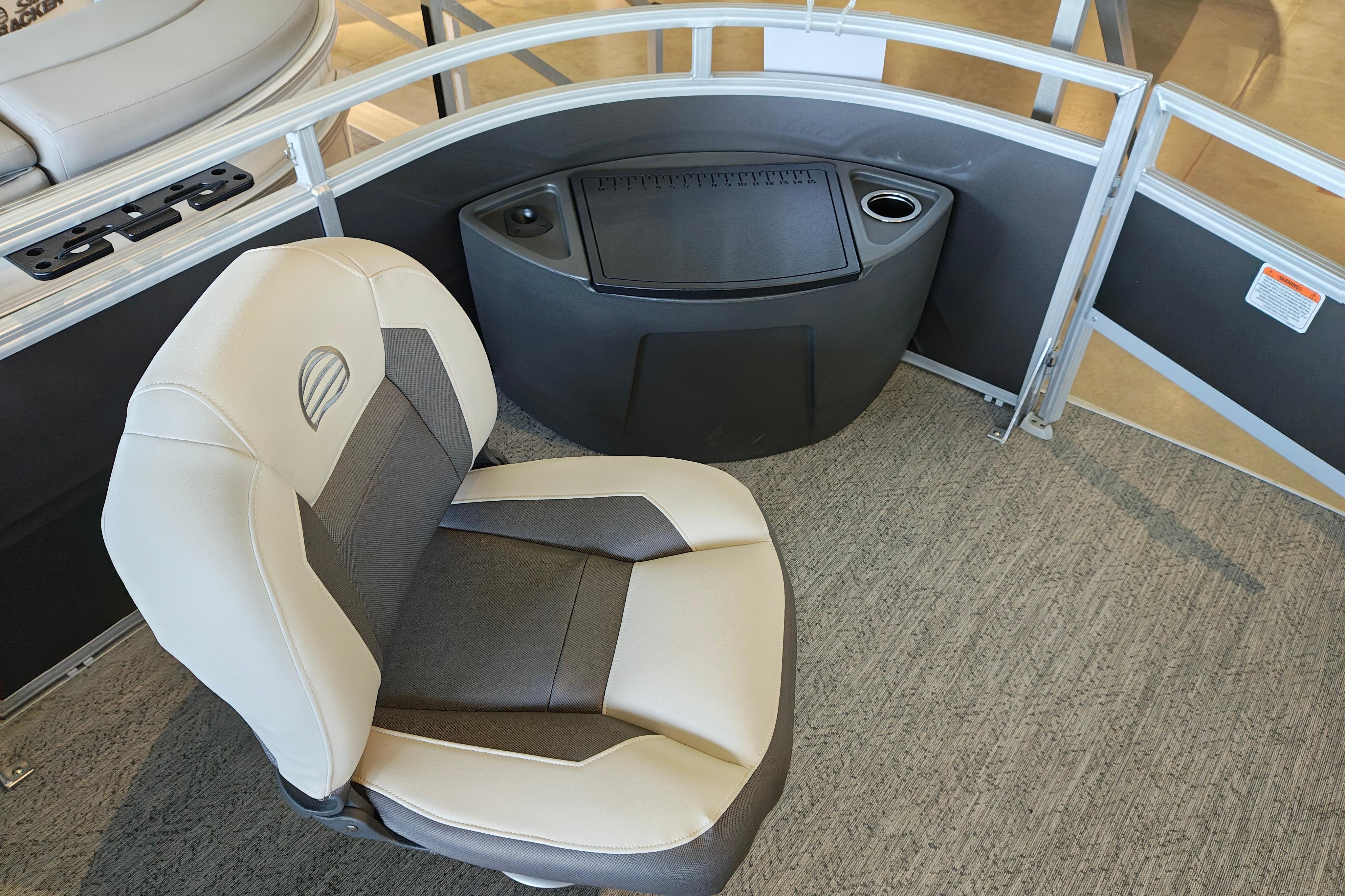 2026 Sun Tracker Fishin' Barge 22 XP3 interior with seating and storage.