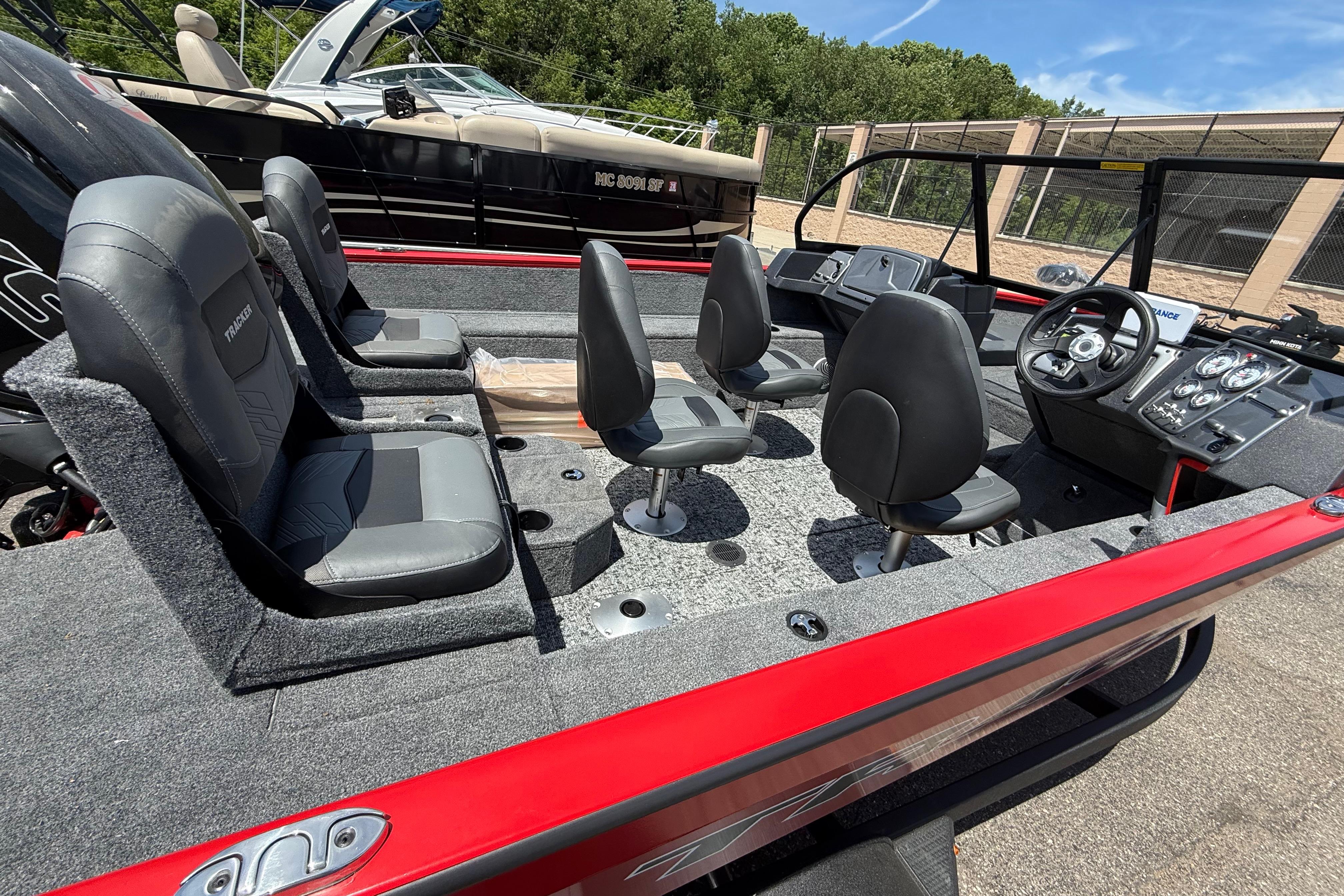 2026 Tracker Pro Guide V-175 Combo boat interior with seating and control panel.