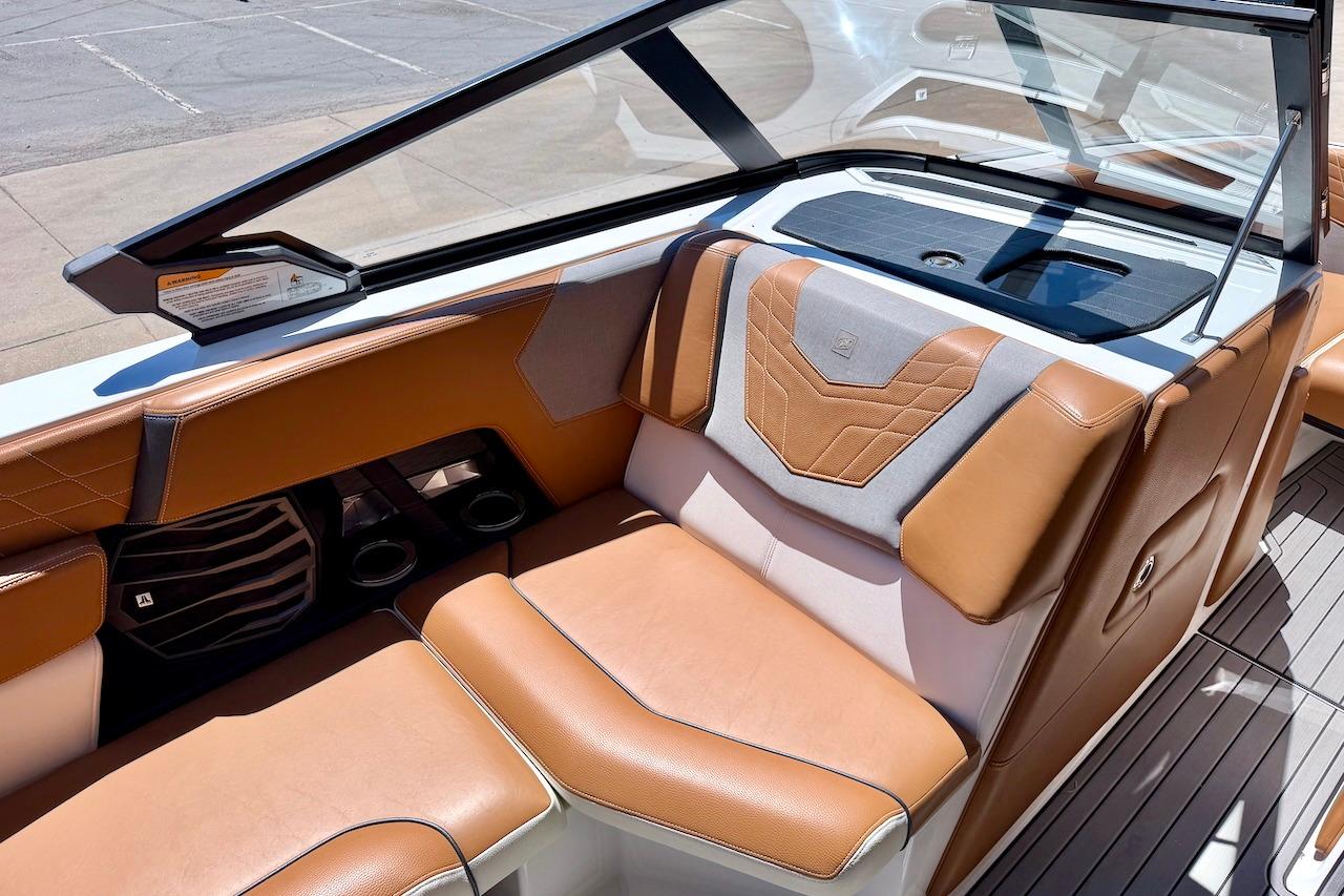 2021 Nautique Super Air Nautique G23 interior with tan and gray seating.
