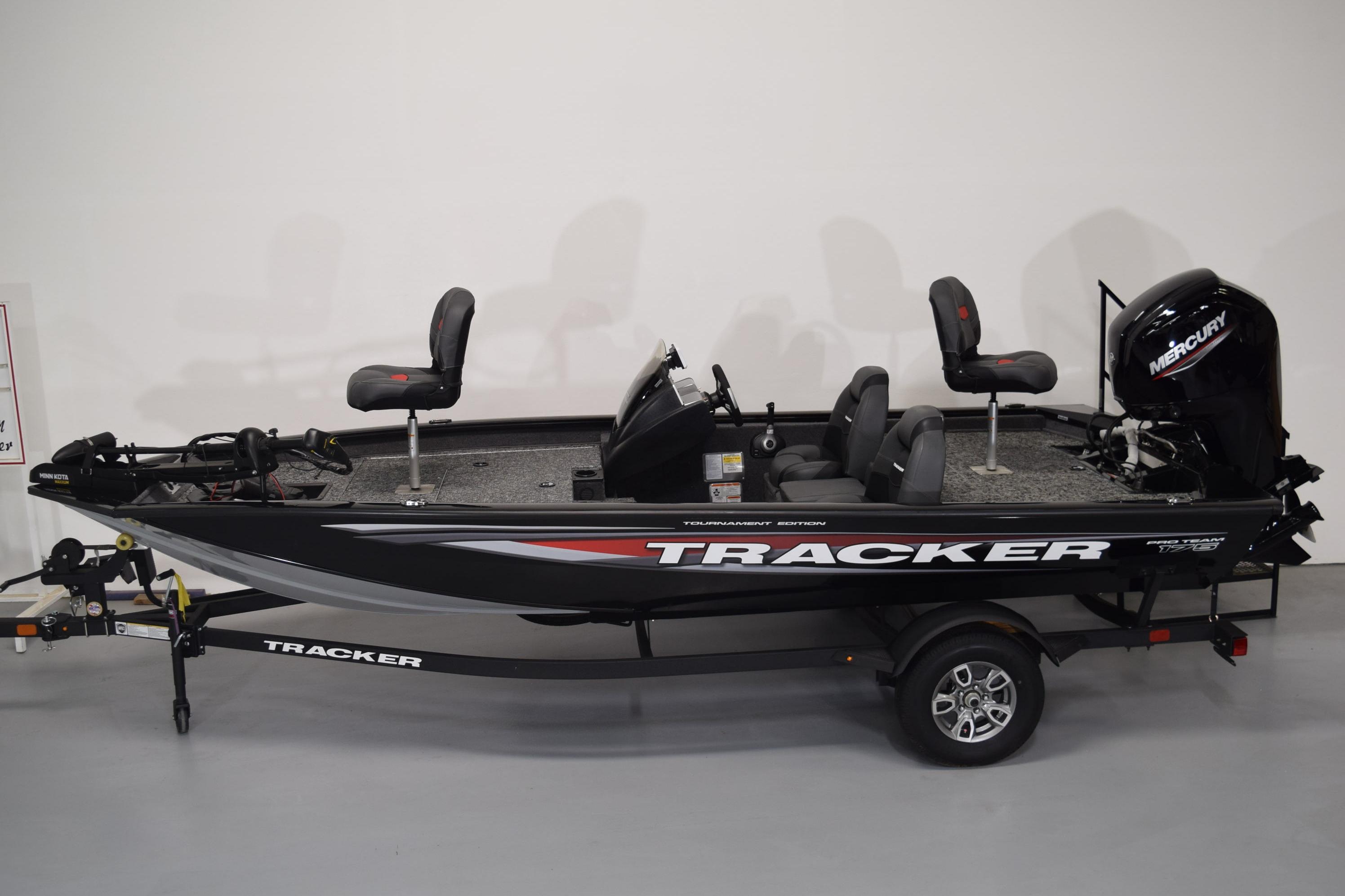 2026 Tracker Pro Team 175 fishing boat with Mercury engine on trailer.