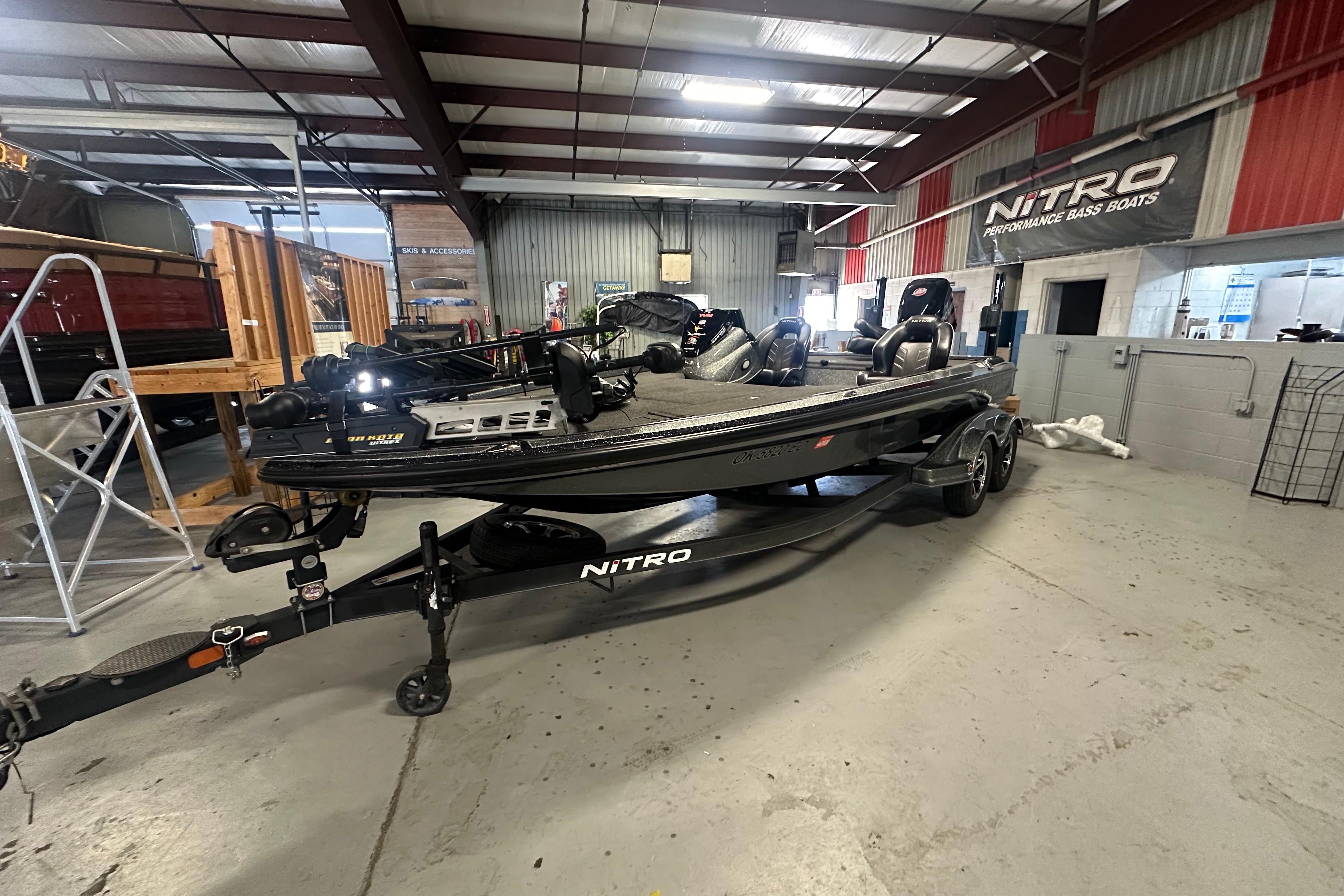 2018 Nitro Z20 Pro bass boat in showroom, showcasing sleek design and advanced features.