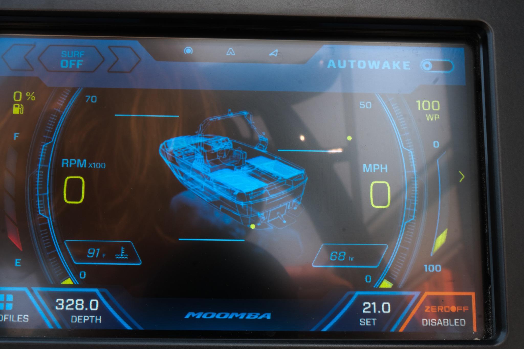 Dashboard display of a 2023 Moomba Mondo boat showing speed, RPM, and fuel levels.