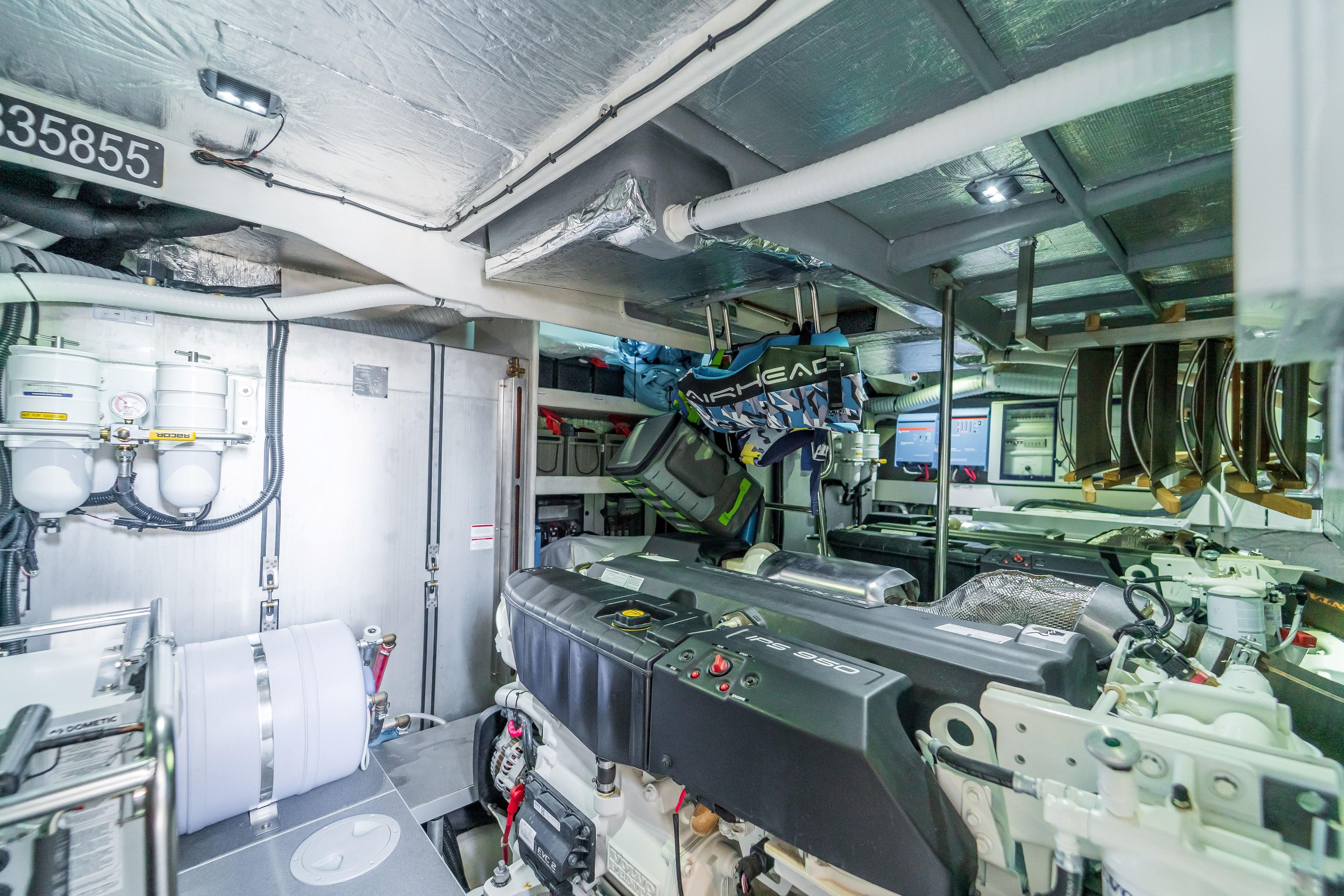 Engine room of 2023 Absolute 62 Fly yacht, showcasing advanced machinery and equipment.