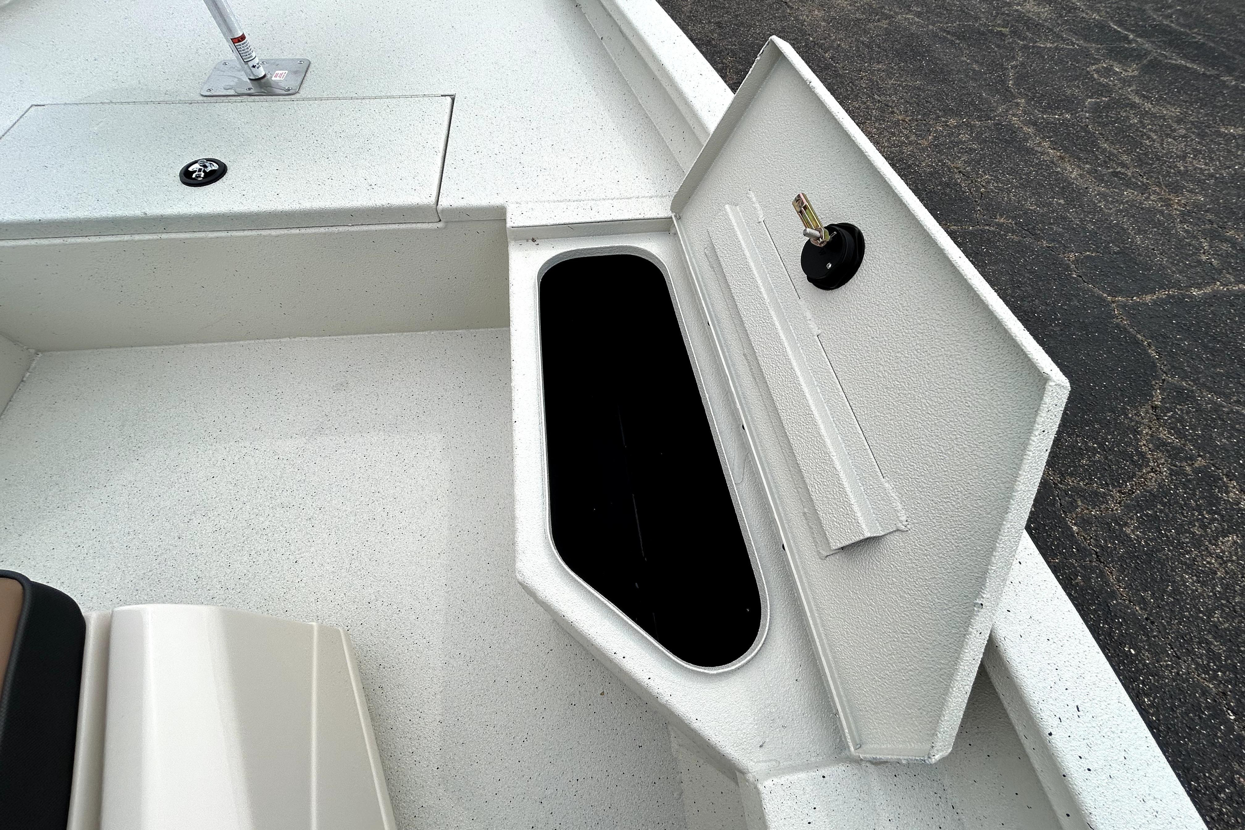 Open storage compartment on 2026 Xpress H20B Bay boat deck.
