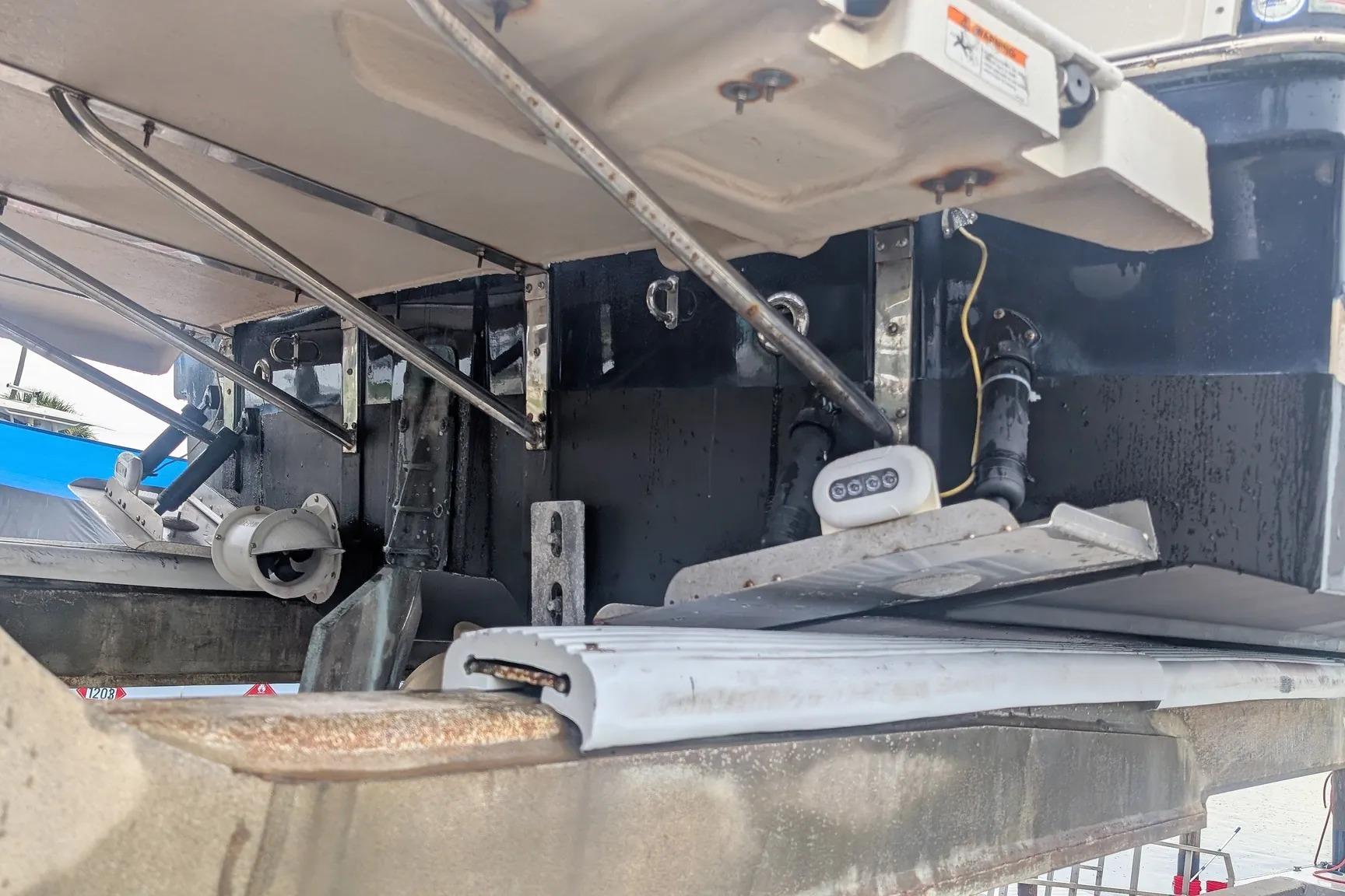 2015 Ranger Tugs R-29 S boat underside showing mechanical components and structure.