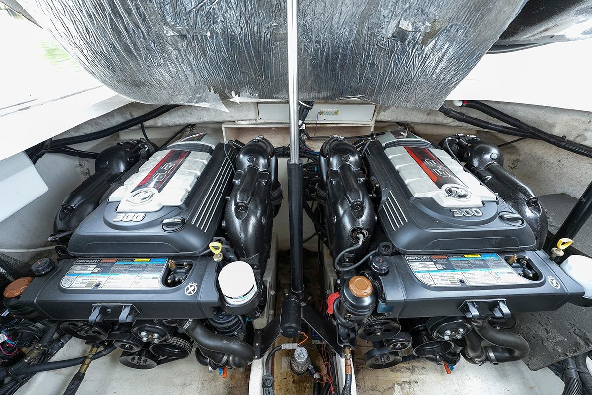 Twin Mercury engines in a 2018 Sea Ray SLX 350 boat engine compartment.