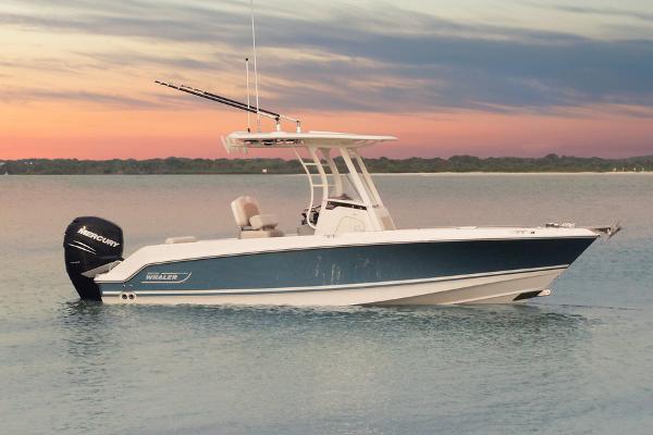Manufacturer Provided Image: 2024 Boston Whaler 230 Outrage boat on calm water at sunset.