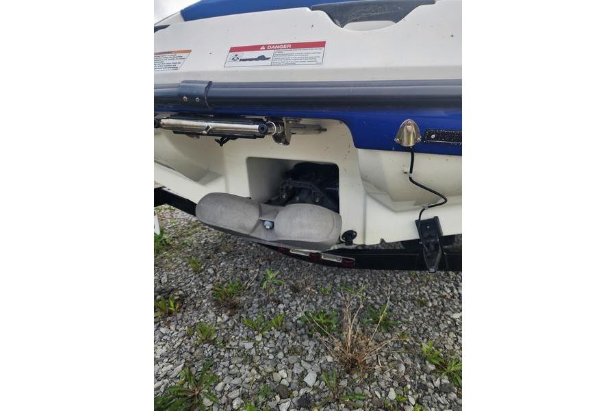 2012 Sea-Doo Sport Boats 180 Challenger rear view, showing engine compartment and warning labels.