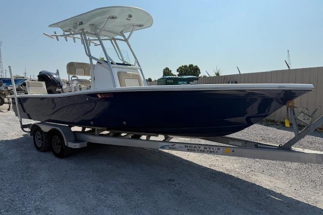 2016 Sea Fox 240 Viper boat on trailer, side view, outdoors.