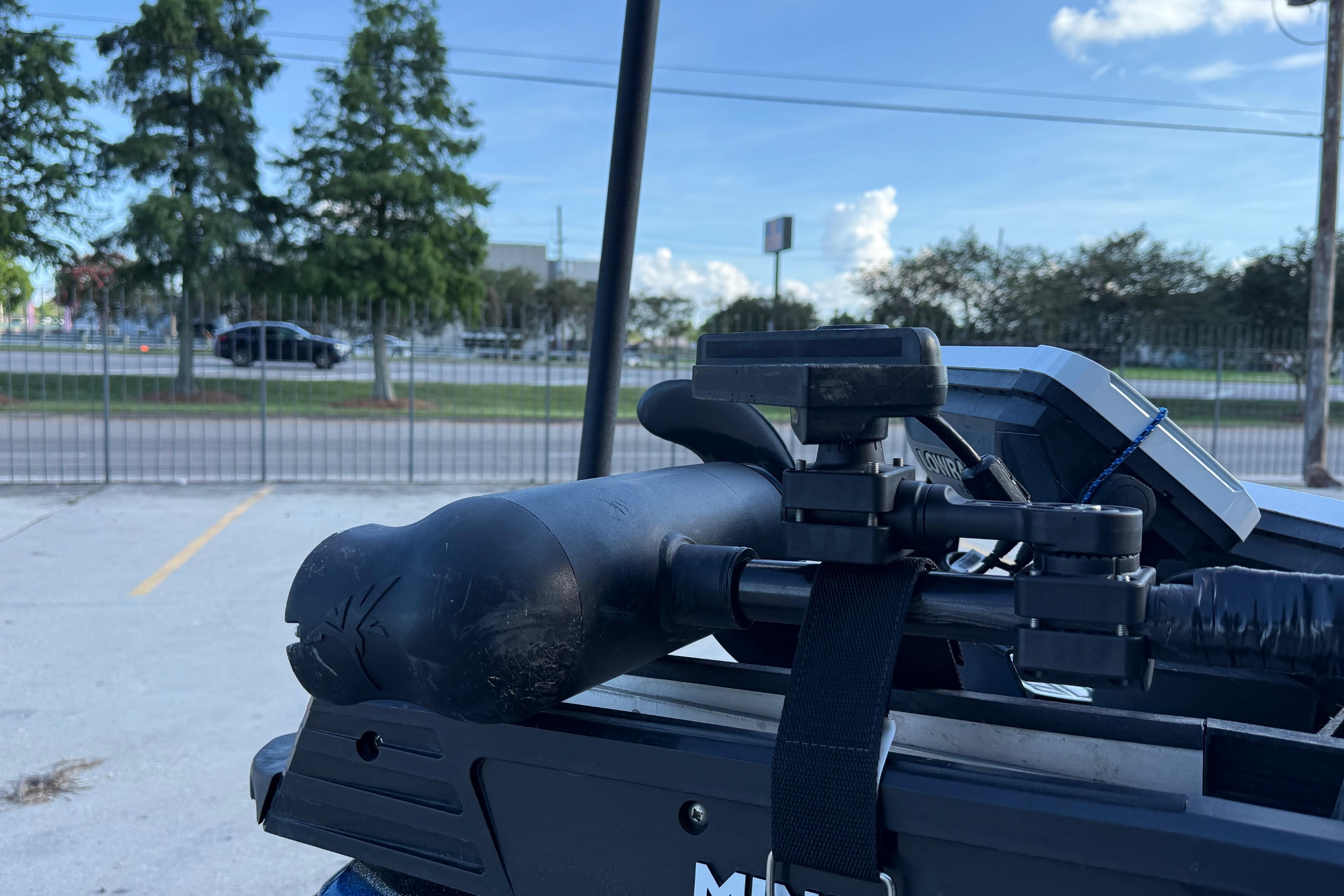 Close-up of a Nitro Z21 boat accessory, 2018 model, with a street view background.