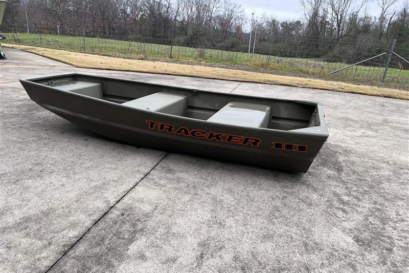2026 Tracker Grizzly 10 Jon boat on concrete surface, outdoors.