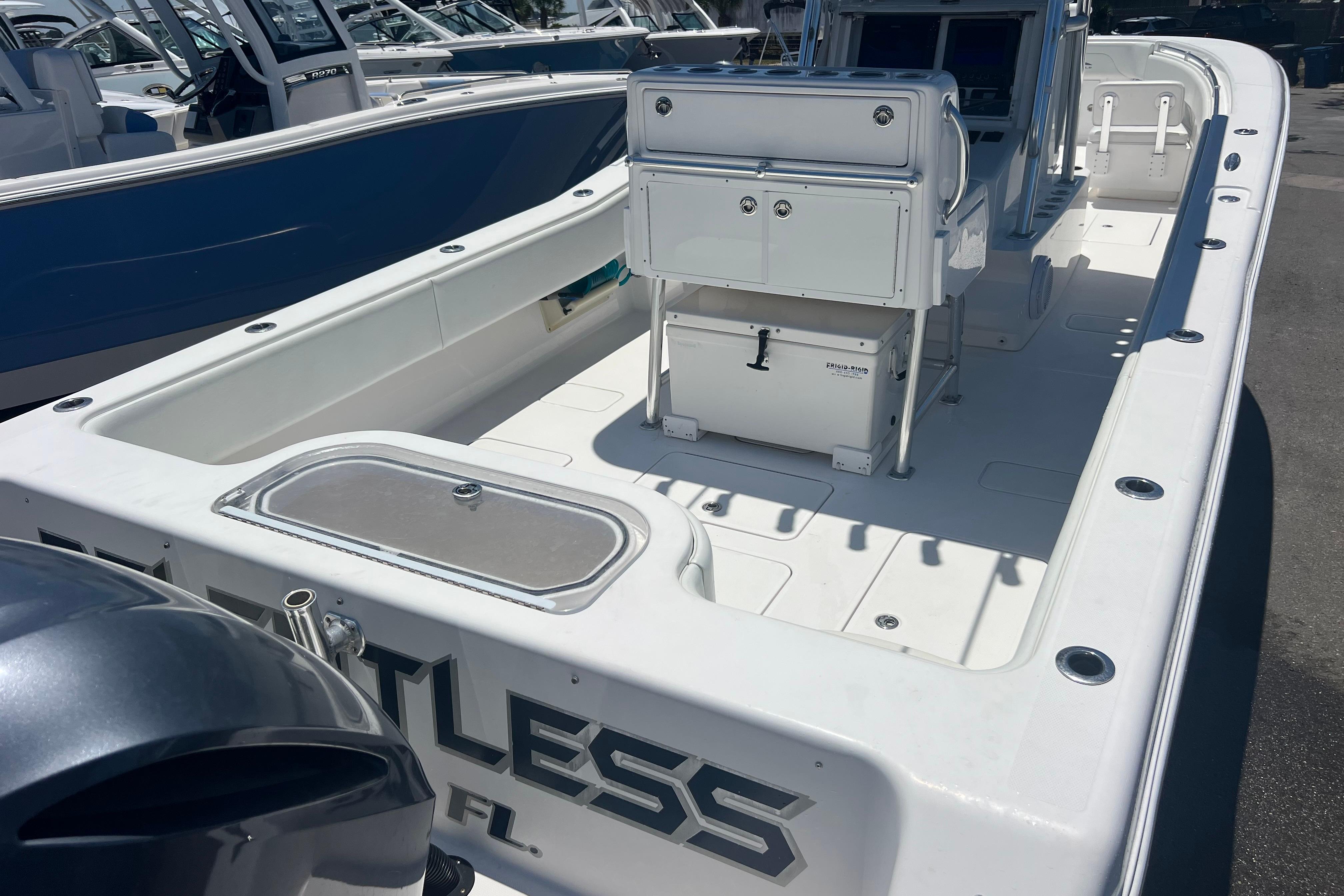 2012 Invincible 33 Open Fisherman boat with spacious deck and seating area.