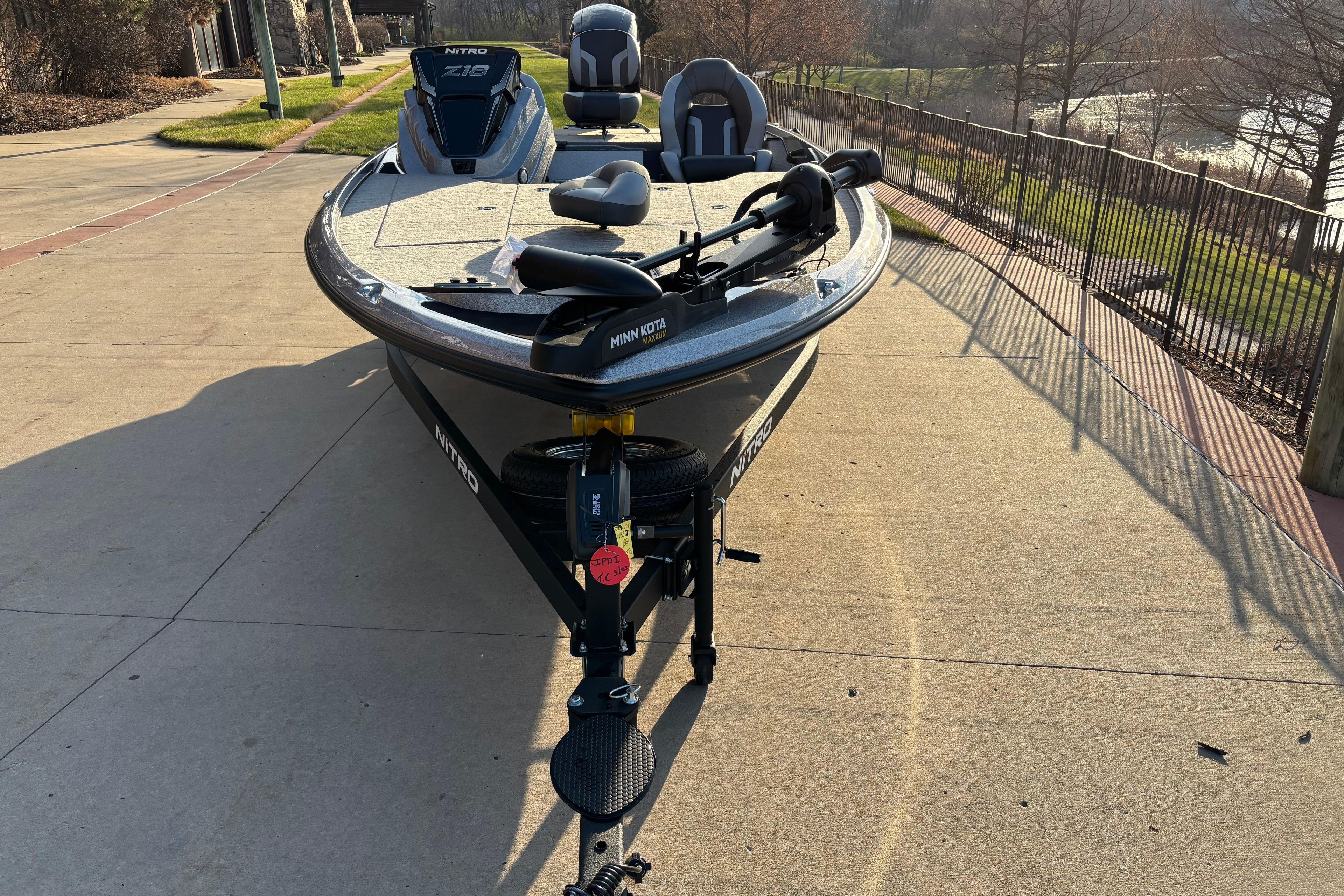 2026 Nitro Z18 boat with Minn Kota motor on a sunny day.