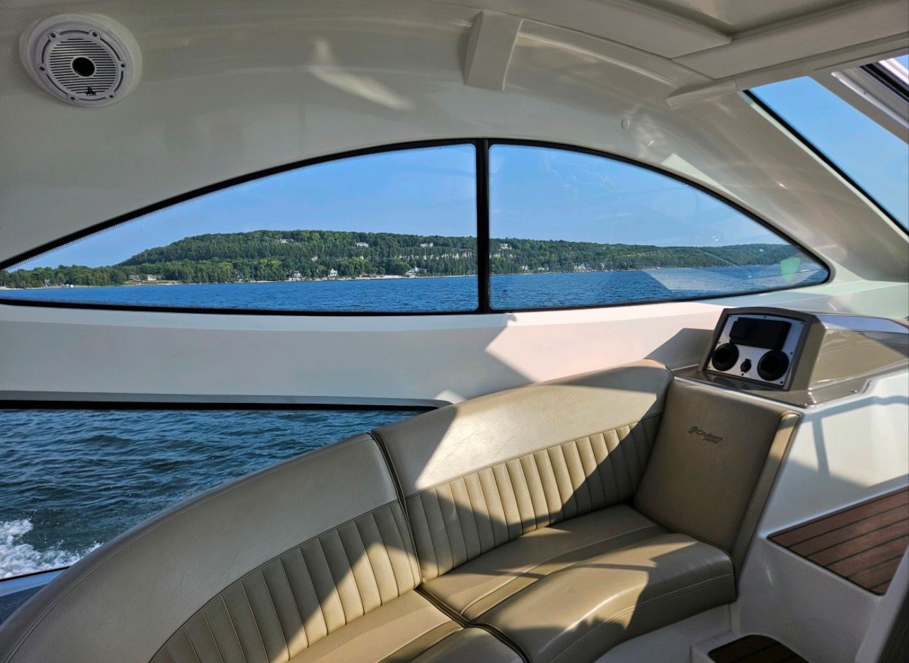 Interior view of a 2009 Cruisers Yachts 520 Sports Coupe with a view of the water.