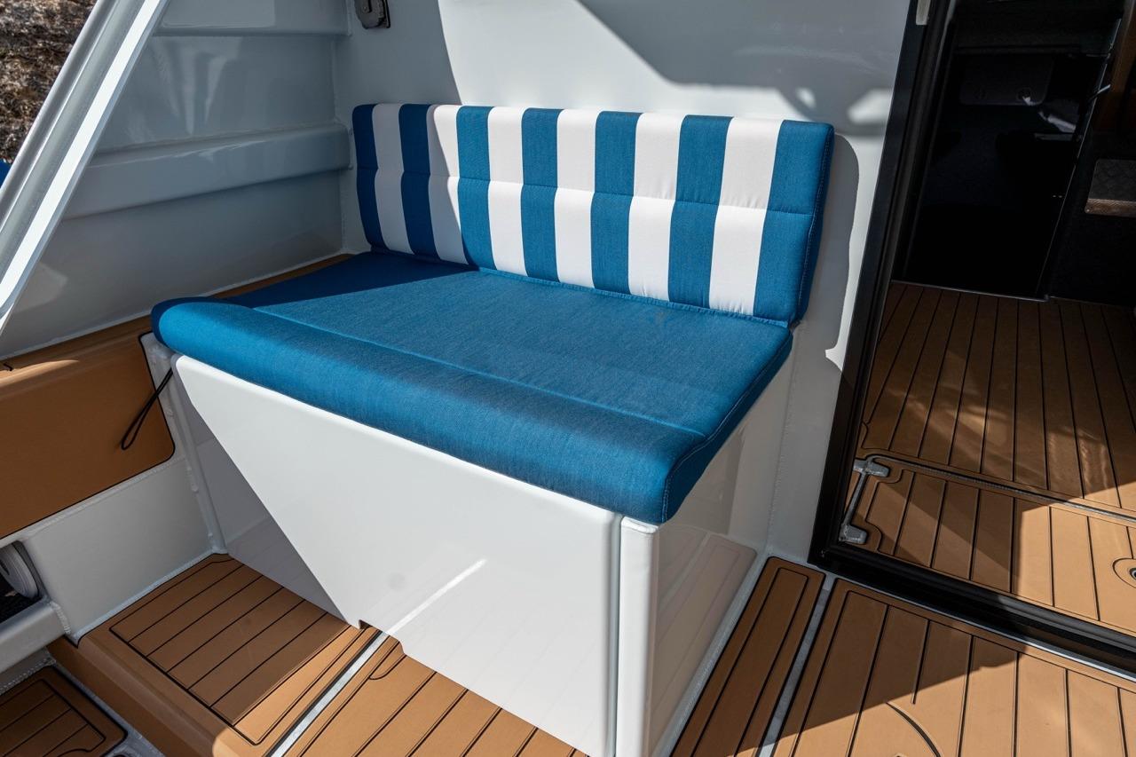 Blue and white striped seating on 2025 Makaira Gen 3 36 boat deck.
