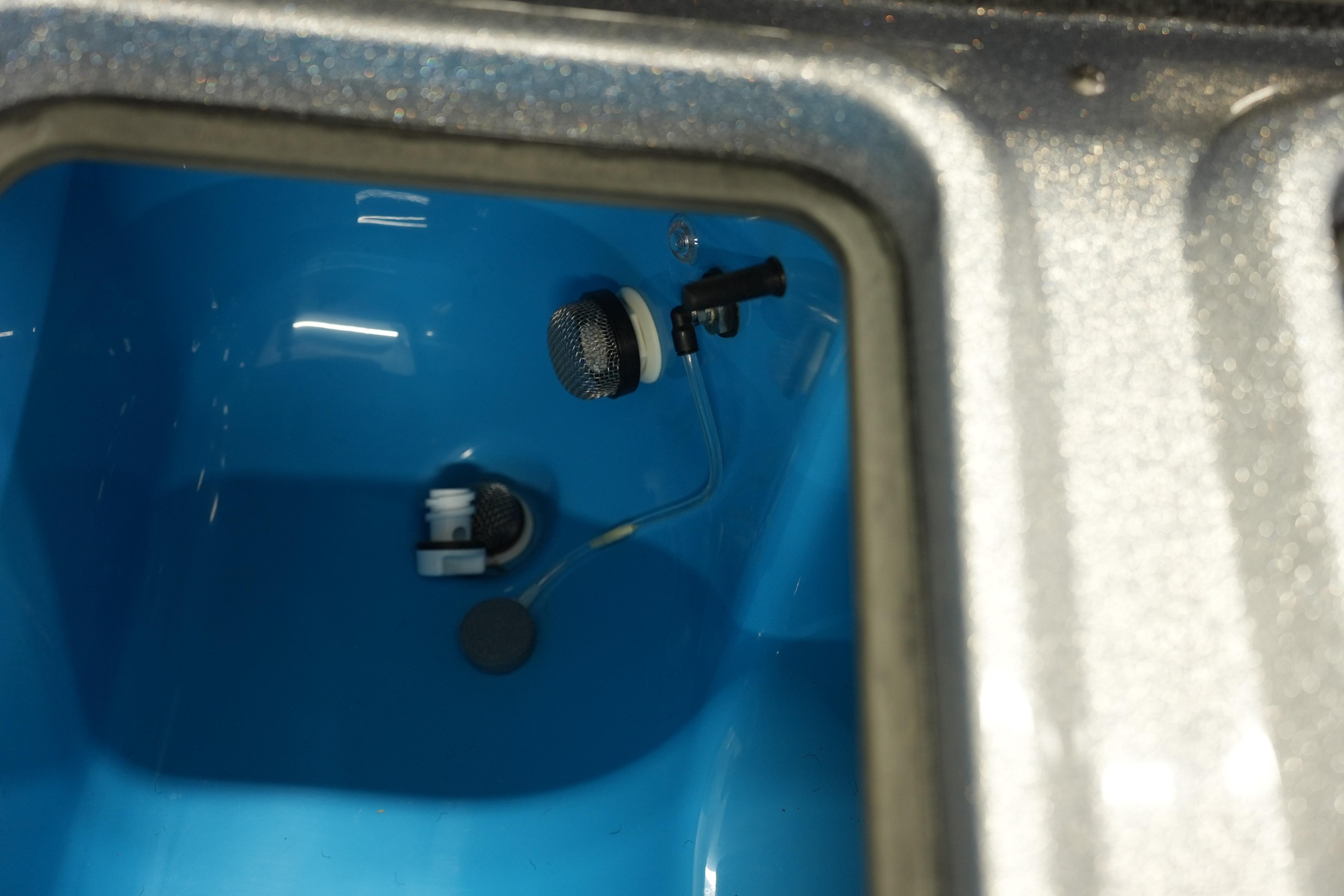 Interior of iKon LXE20 (2026) with blue compartment and components.