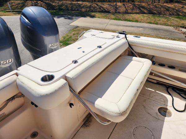 2015 Grady-White Freedom 275 boat with dual engines and foldable seating.