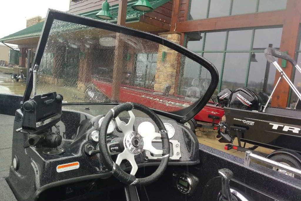 Interior view of a 2026 Nitro ZV19 Sport Pro boat with steering wheel and dashboard.