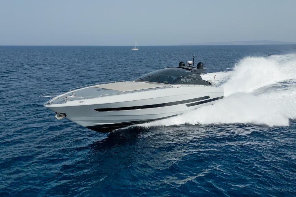 2008 Baia Italia 70 yacht cruising swiftly on open sea.