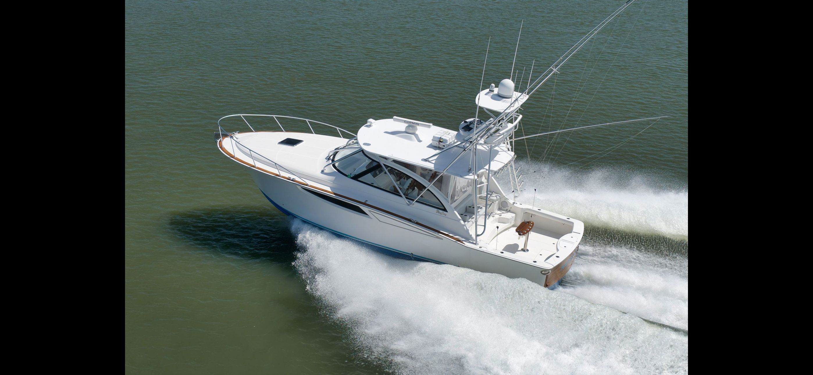 Mag Bay 42 Express 2022 cruising swiftly on water.