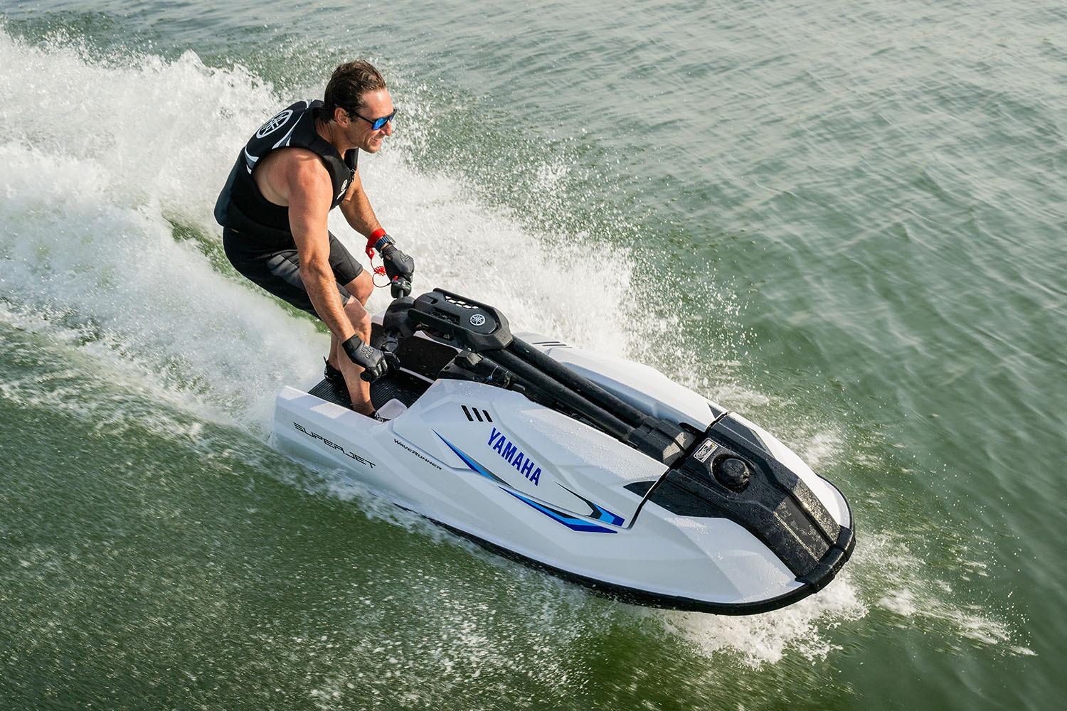 Manufacturer Provided Image: 2026 Yamaha WaveRunner SuperJet speeding on water with rider in action.