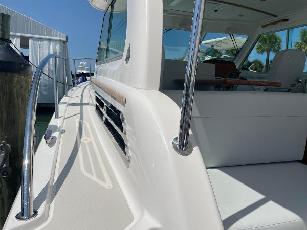 2024 Back Cove 34O yacht side deck and seating area.