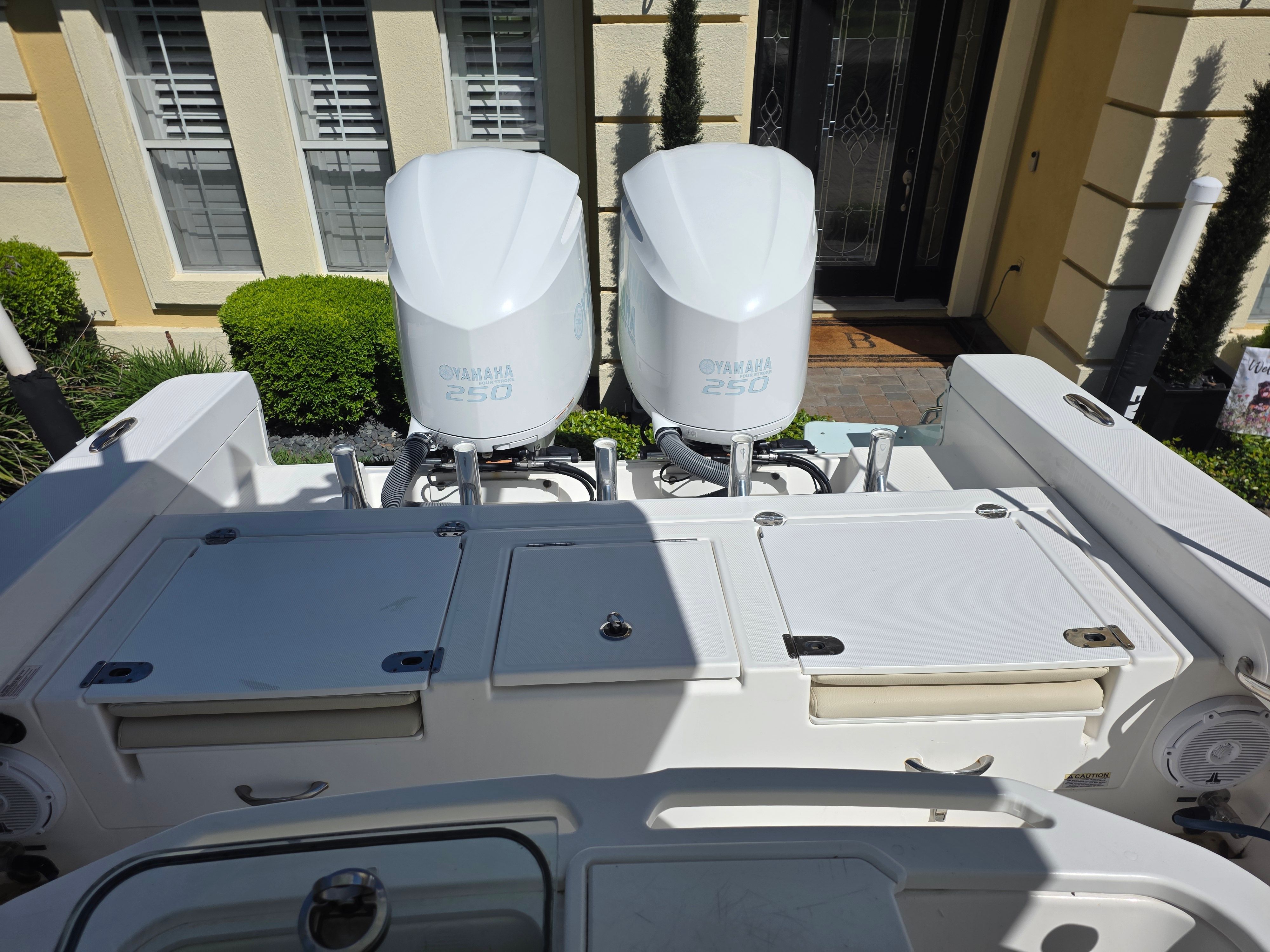 Two Yamaha 250 outboard engines are mounted on an Everglades 273 Center Console boat.