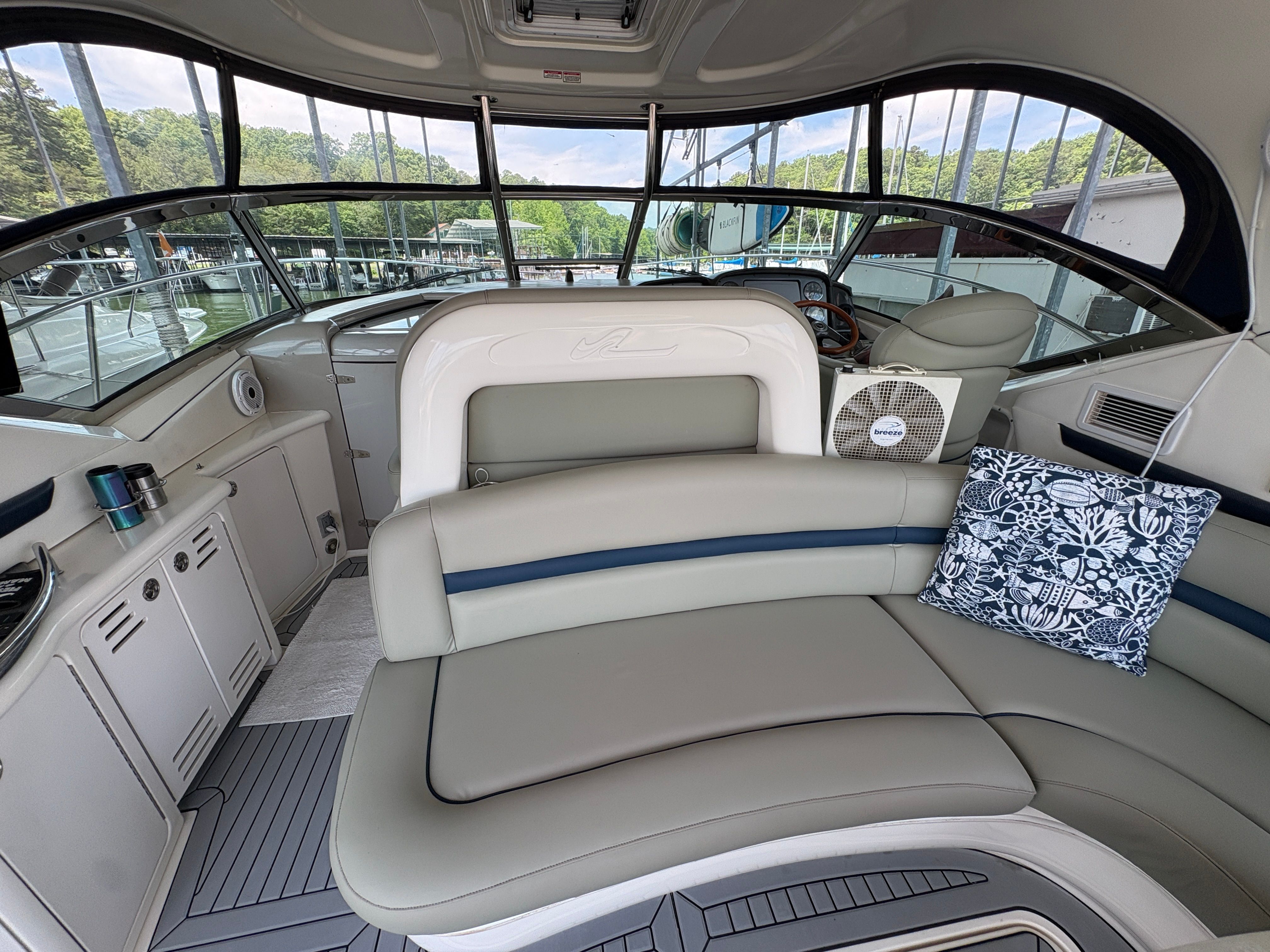 Interior of a 2005 Sea Ray 420 Sundancer yacht with seating area.