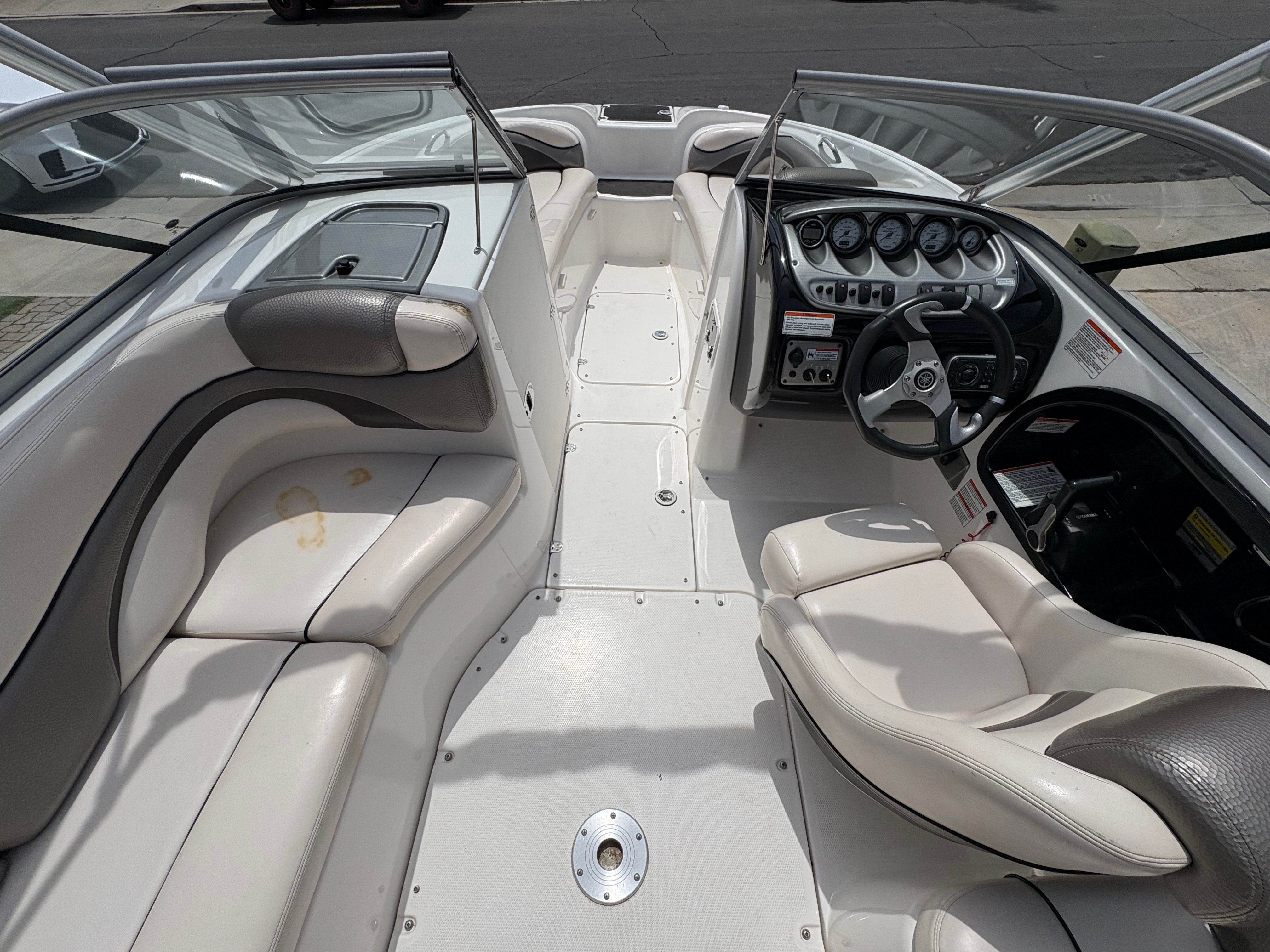 Interior of a 2009 Yamaha Boats 212X with steering console.