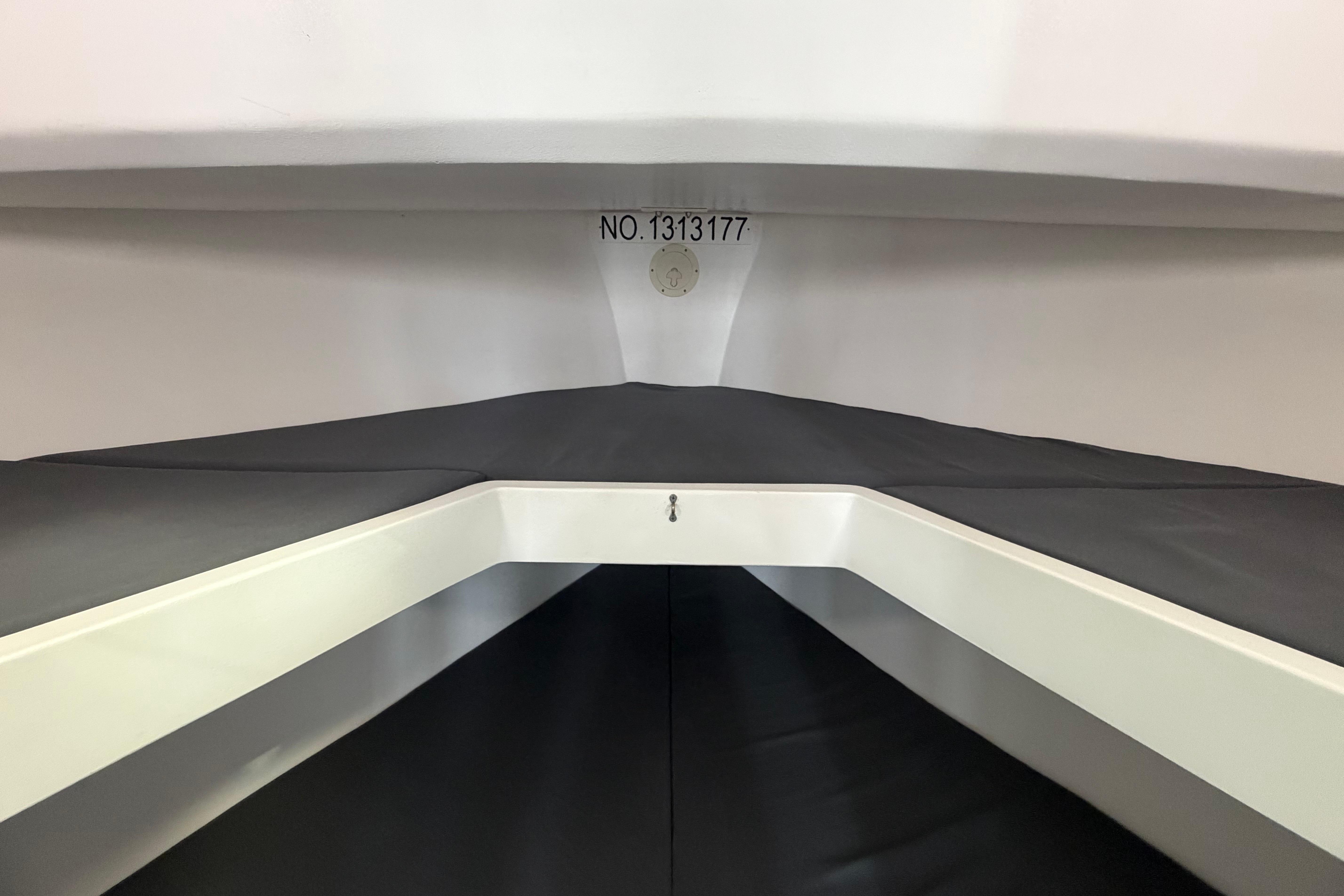 Interior view of 2018 H&H Marine Osmond Beal boat, featuring a sleek, modern design.