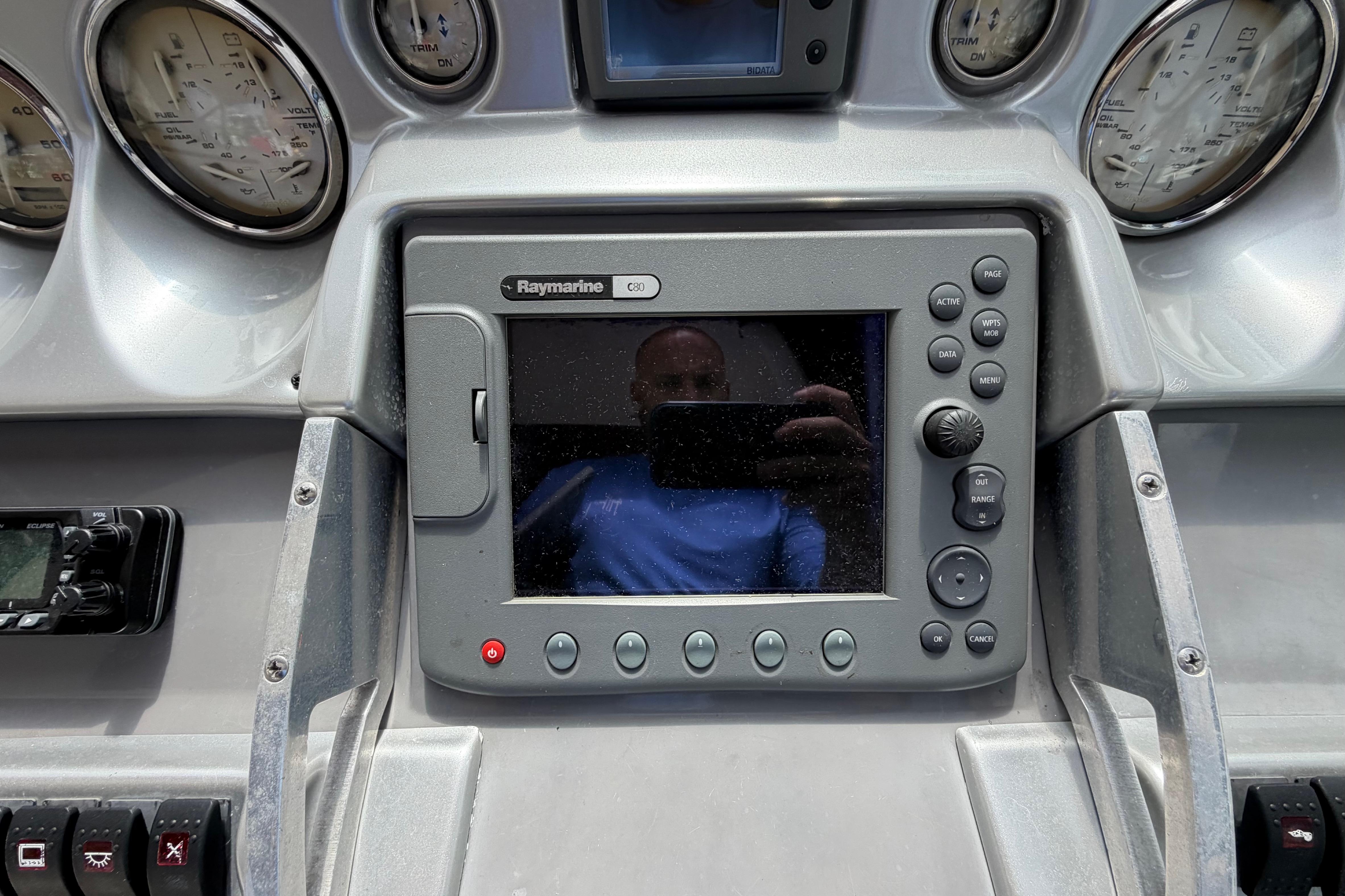 Dashboard of a 2007 Monterey 350 Sport Yacht with Raymarine C80 display.